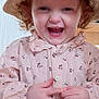 toddler, child, hat, straw_hat, pink_shirt, cherry_pattern, happy, laughing, indoor, curly_hair, face, person, cute, buttoned_shirt, young_child, smiling, clothing, portrait, hands, radiant