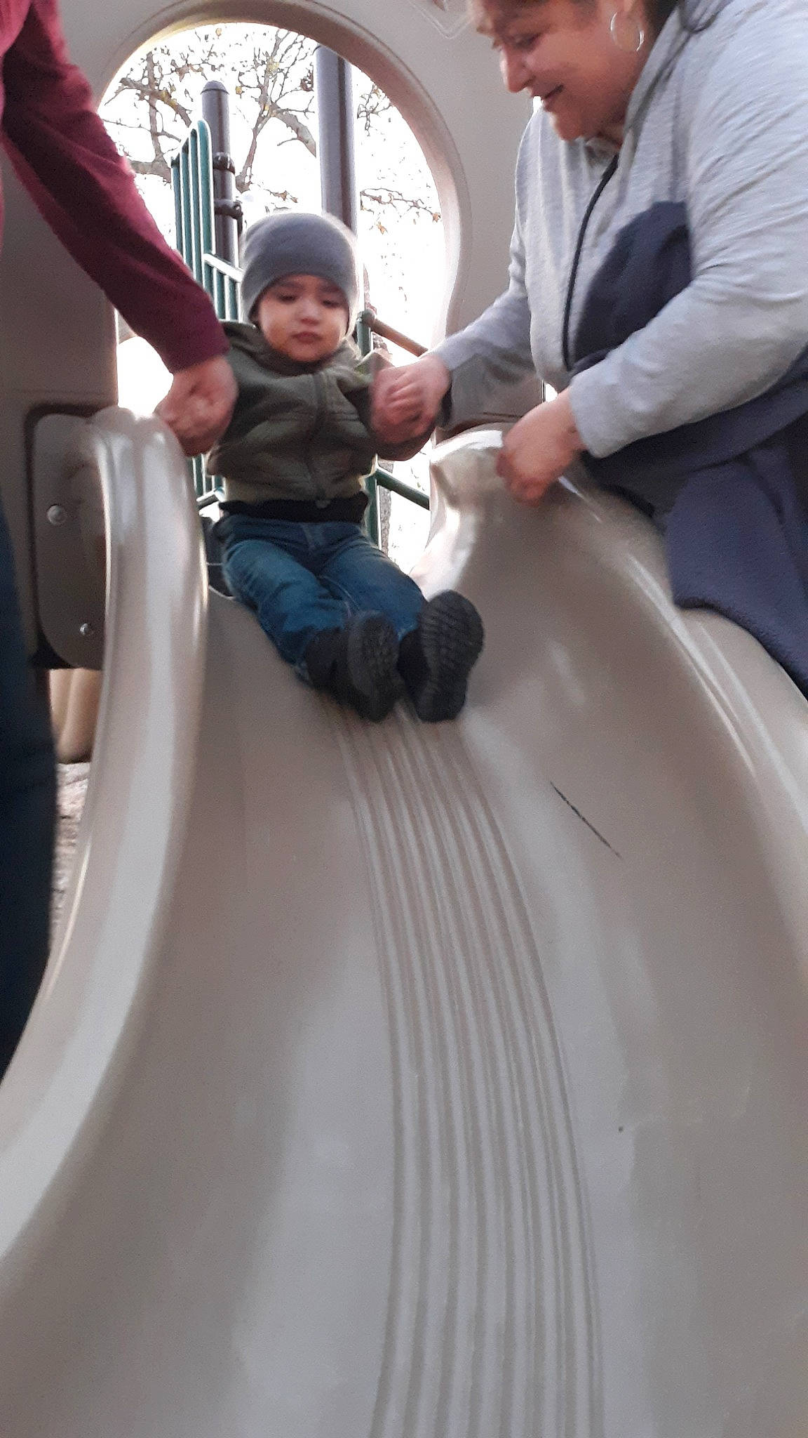 Paul is registered to the contest to win money with this photo: child, fun, headwear, joy, leisure, outdoor_play_equipment, person, playground_slide, recreation, smile