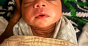 Nikolai joined the competition — help win amazing prizes! newborn, baby, infant, sleeping, face, portrait, swaddled, blanket, bedding, indoors, close_up, eyes_closed, peaceful, cozy, curly_hair, onesie, head, child, home, photography