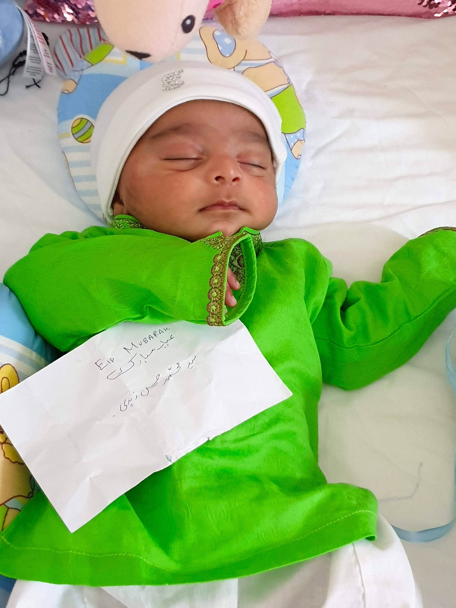 Hassan joined the competition — help win amazing prizes! baby, child, green, headwear, person, toddler