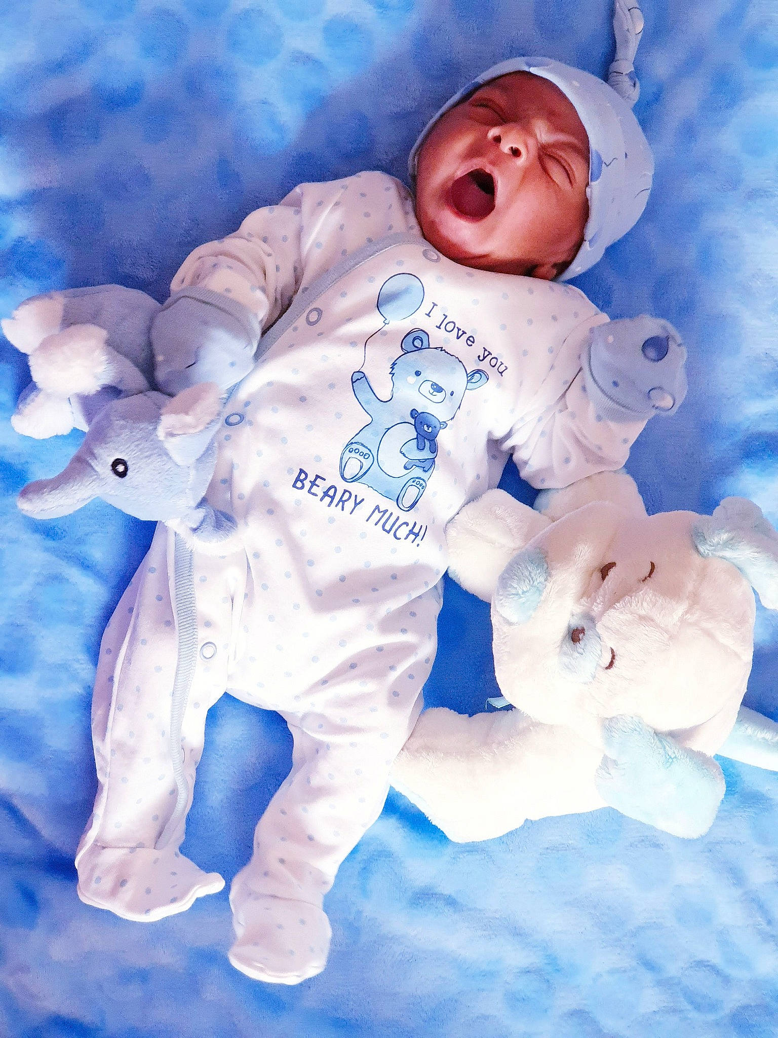 Hassan joined the competition — help win amazing prizes! baby, blue, child, headwear, illustration, person, playing_in_the_snow, smile, toddler