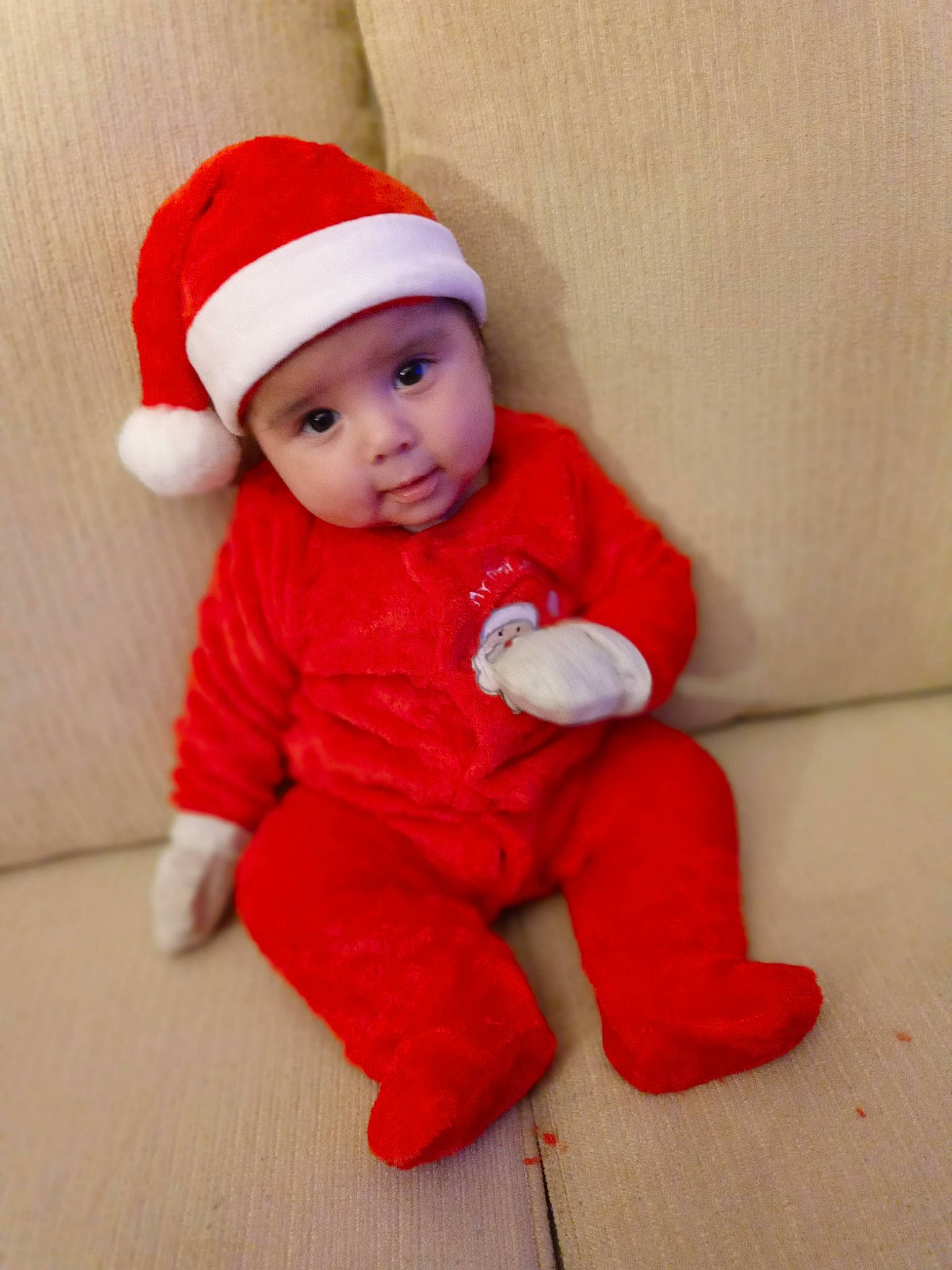 Gionni joined the competition — help win amazing prizes! baby, baby_toddler_clothing, beanie, cap, carmine, child, clothing, collar, costume_hat, flooring, fur, hat, headwear, knit_cap, outerwear, peach, person, sleeve, smile, toddler