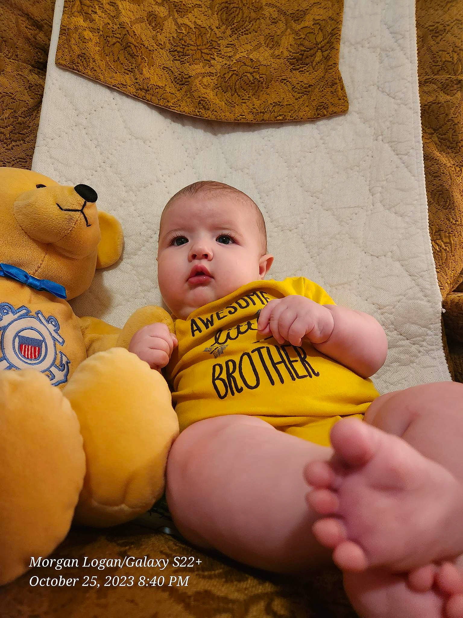 Ocean is registered to the contest to win money with this photo: abdomen, baby, baby_toddler_clothing, cheek, child, comfort, finger, foot, hand, happy, linens, people_in_nature, person, skin, stuffed_toy, textile, thigh, thumb, toddler, toy