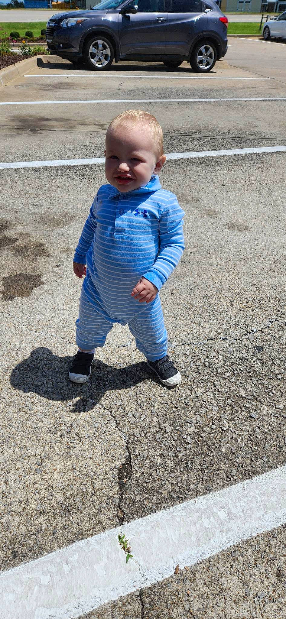 Deuteronomy joined the competition — help win amazing prizes! asphalt, baby, baby_toddler_clothing, ball, child, electric_blue, eye, flooring, grass, head, human_leg, leg, people_in_nature, person, recreation, road_surface, sidewalk, sitting, soil, toddler