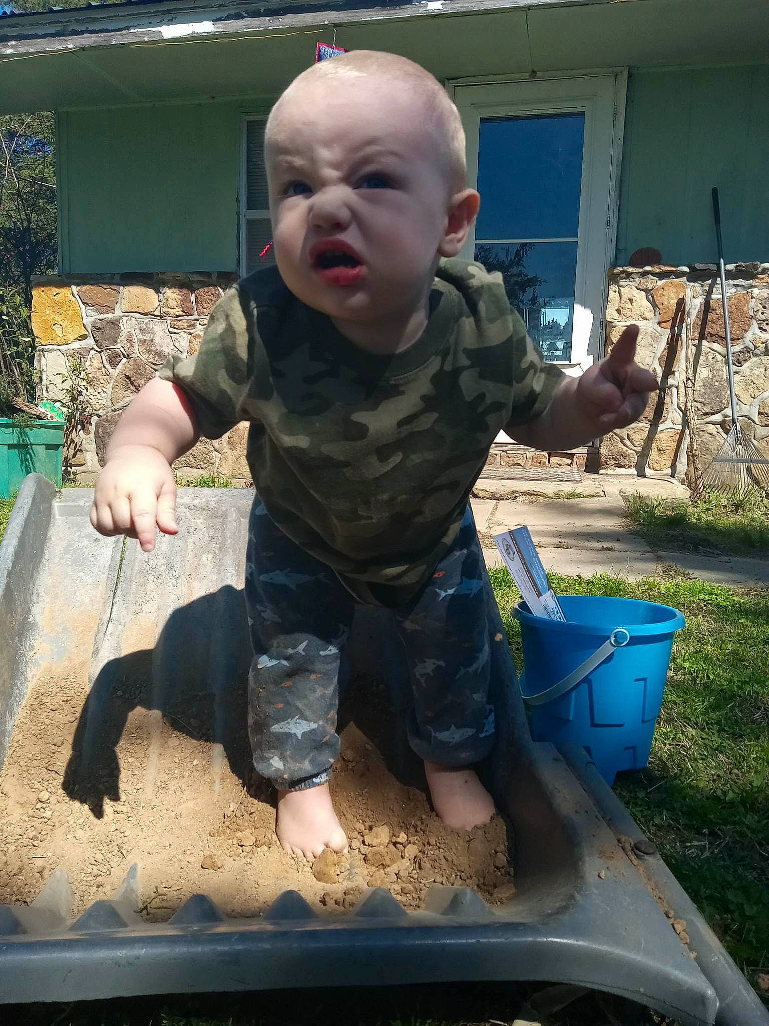 Deuteronomy joined the competition — help win amazing prizes! anger, baby, baby_toddler_clothing, barefoot, boats_and_boating_equipment_and_supplies, child, fun, grass, leisure, person, plant, plastic, play, recreation, sitting, soil, sorrow, t_shirt, toddler, vacation