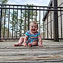 Mahala Logan joined the competition — help win amazing prizes! baby, infant, child, smiling, laughing, porch, wooden_deck, railing, balcony, outdoors, trees, house, striped_clothes, colorful_clothes, barefoot, sitting, happy, face, chubby_cheeks, toes