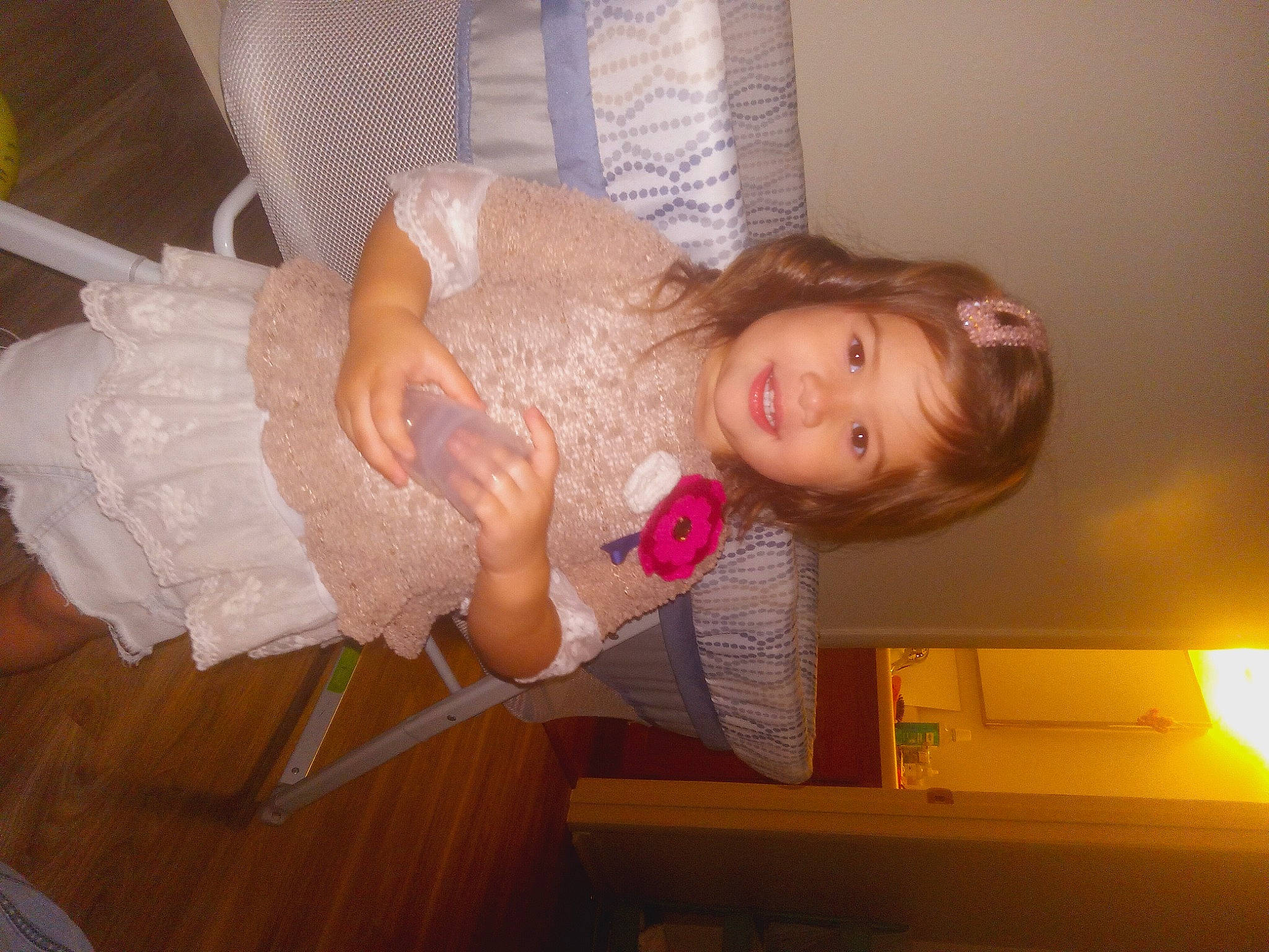 Rowan is registered to the contest to win money with this photo: beauty, bridal_accessory, child, comfort, dress, finger, flooring, fun, hand, happy, hardwood, human_leg, joy, long_hair, person, room, toddler, wedding_dress, wood