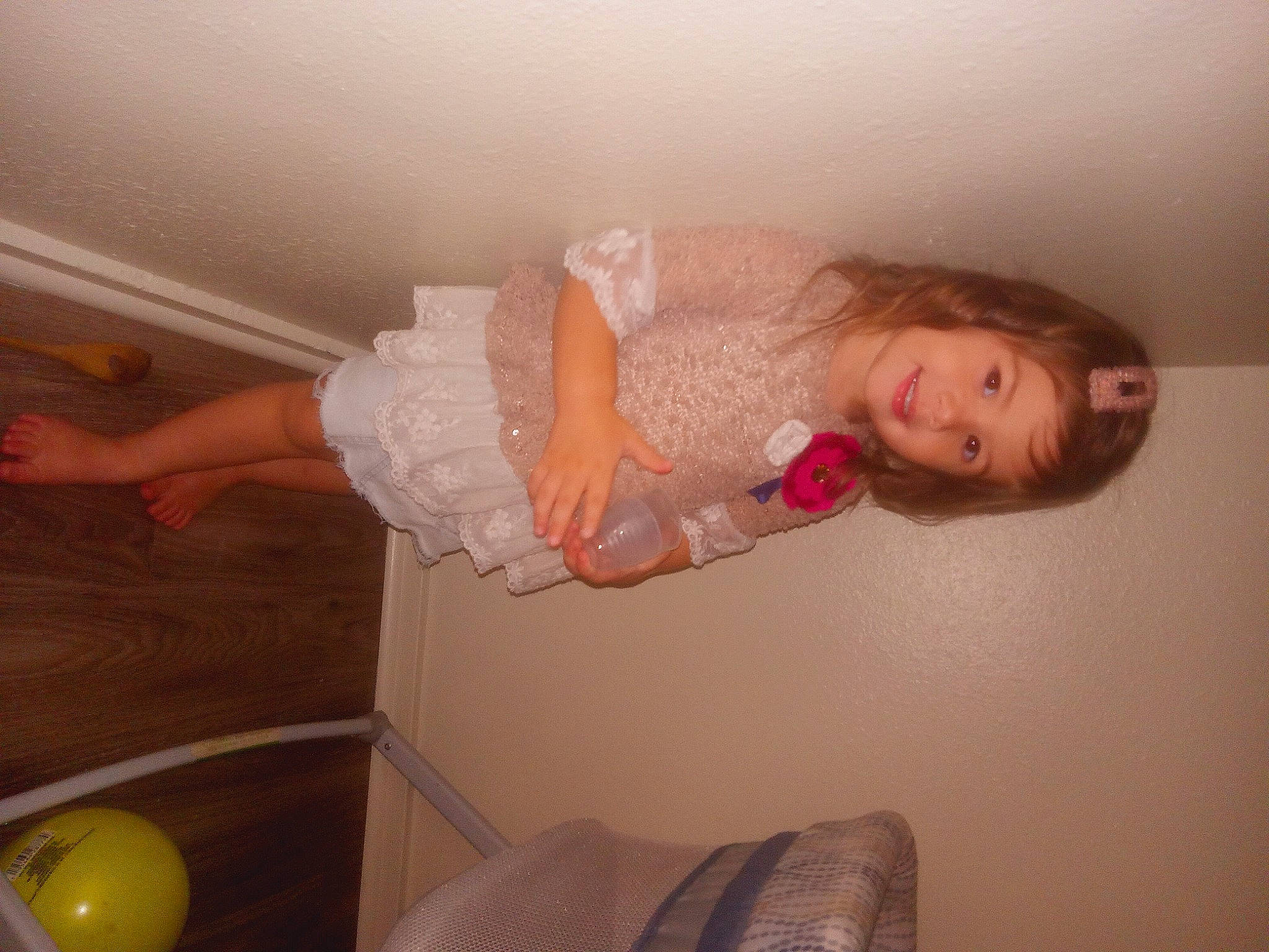 Rowan is registered to the contest to win money with this photo: balloon, blond, child, comfort, dress, elbow, finger, flash_photography, fun, happy, head, human_leg, joy, knee, leg, mouth, person, pink, room, skin