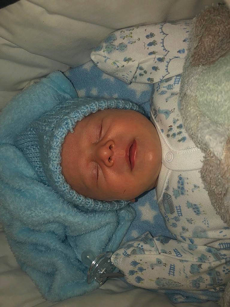 Zack-charlie is registered to the contest to win money with this photo: baby, baby_sleeping, bed, bed_sheet, bedding, bedtime, blanket, cheek, child, comfort, face, head, headwear, linens, mammal, nap, nose, pattern, person, sleep