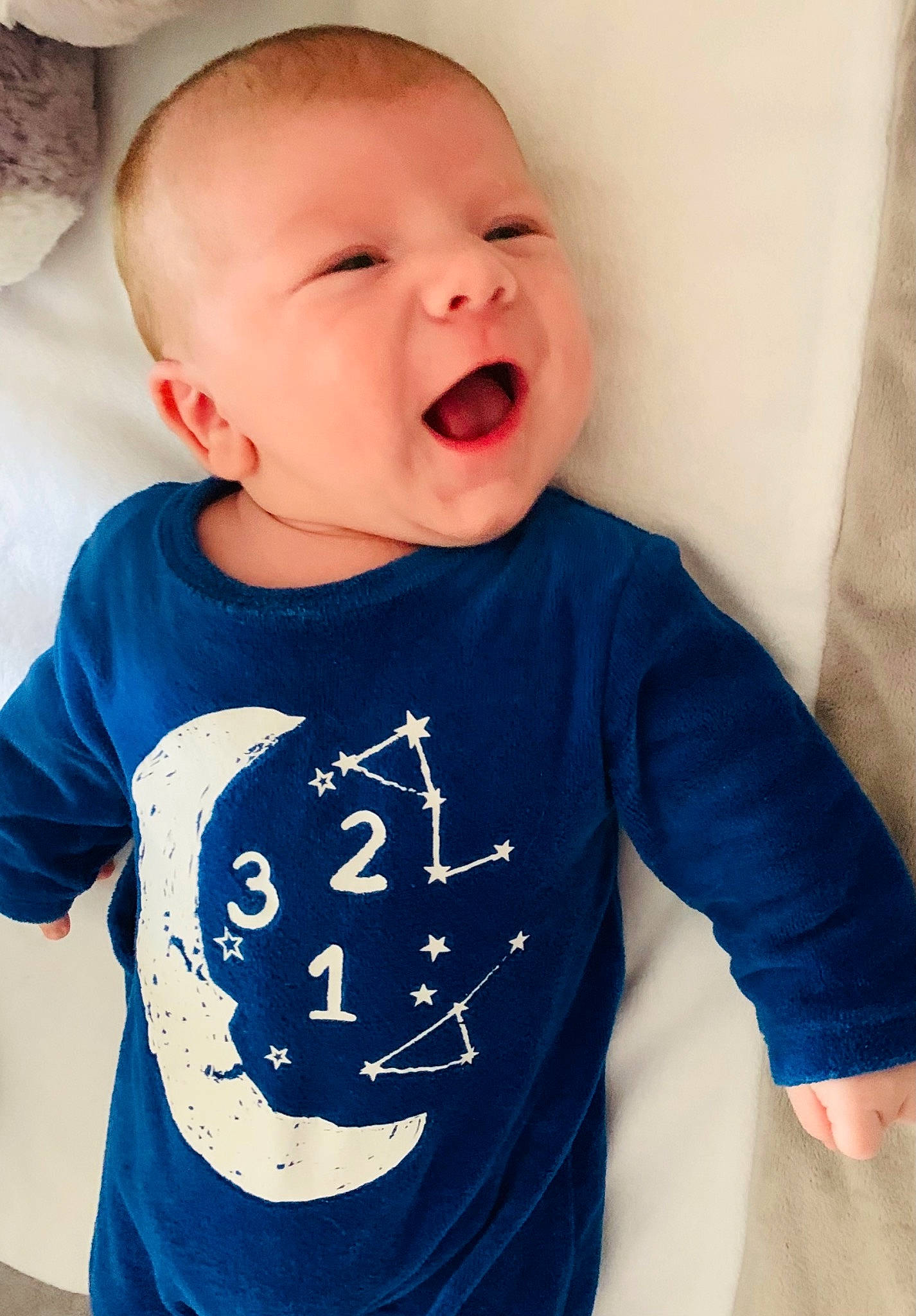 Mahë participe au concours pour gagner de l'argent avec cette photo : azure, baby, baby_toddler_clothing, blue, cheek, chin, cool, face, facial_expression, happy, mouth, neck, outerwear, person, shoulder, skin, sleeve, smile, t_shirt, textile