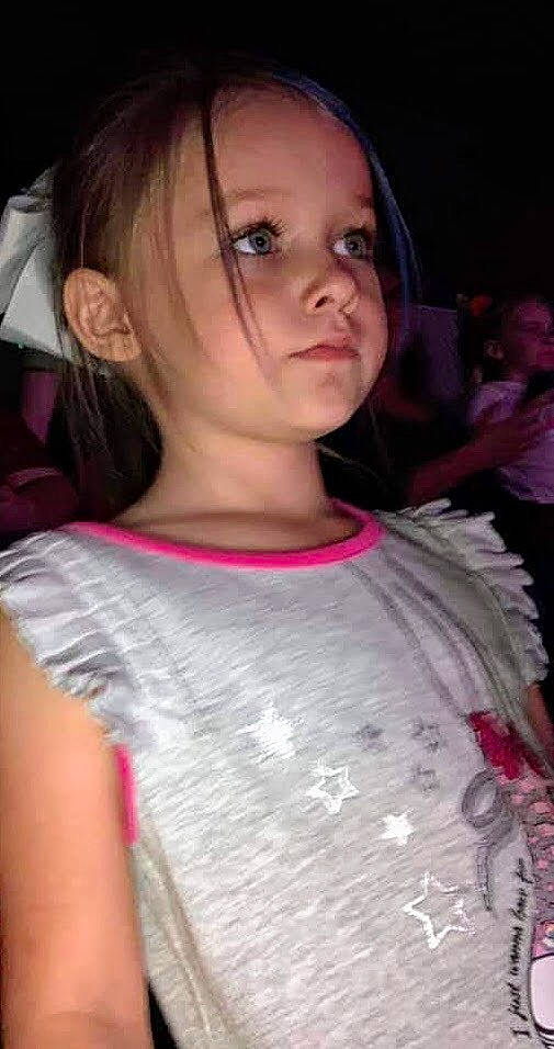 Paisley is registered to the contest to win money with this photo: bangs, beauty, black_hair, brown_hair, cheek, child_model, chin, cool, eye, eyebrow, eyelash, face, fashion, hair, hairstyle, lip, long_hair, neck, nose, person