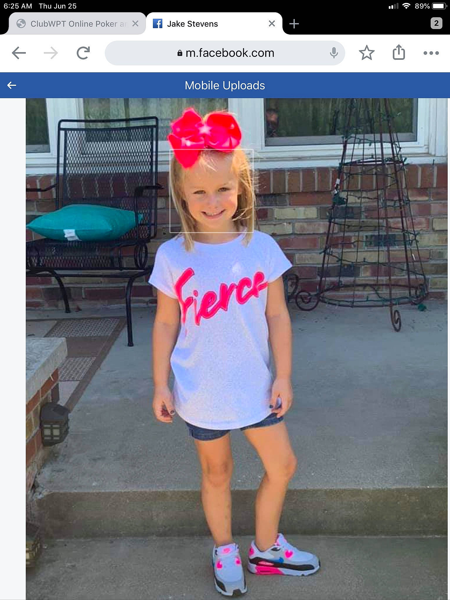 Paisley is registered to the contest to win money with this photo: cap, child, clothing, footwear, headgear, joy, person, photo_caption, photography, shoe, sleeve, snapshot, t_shirt