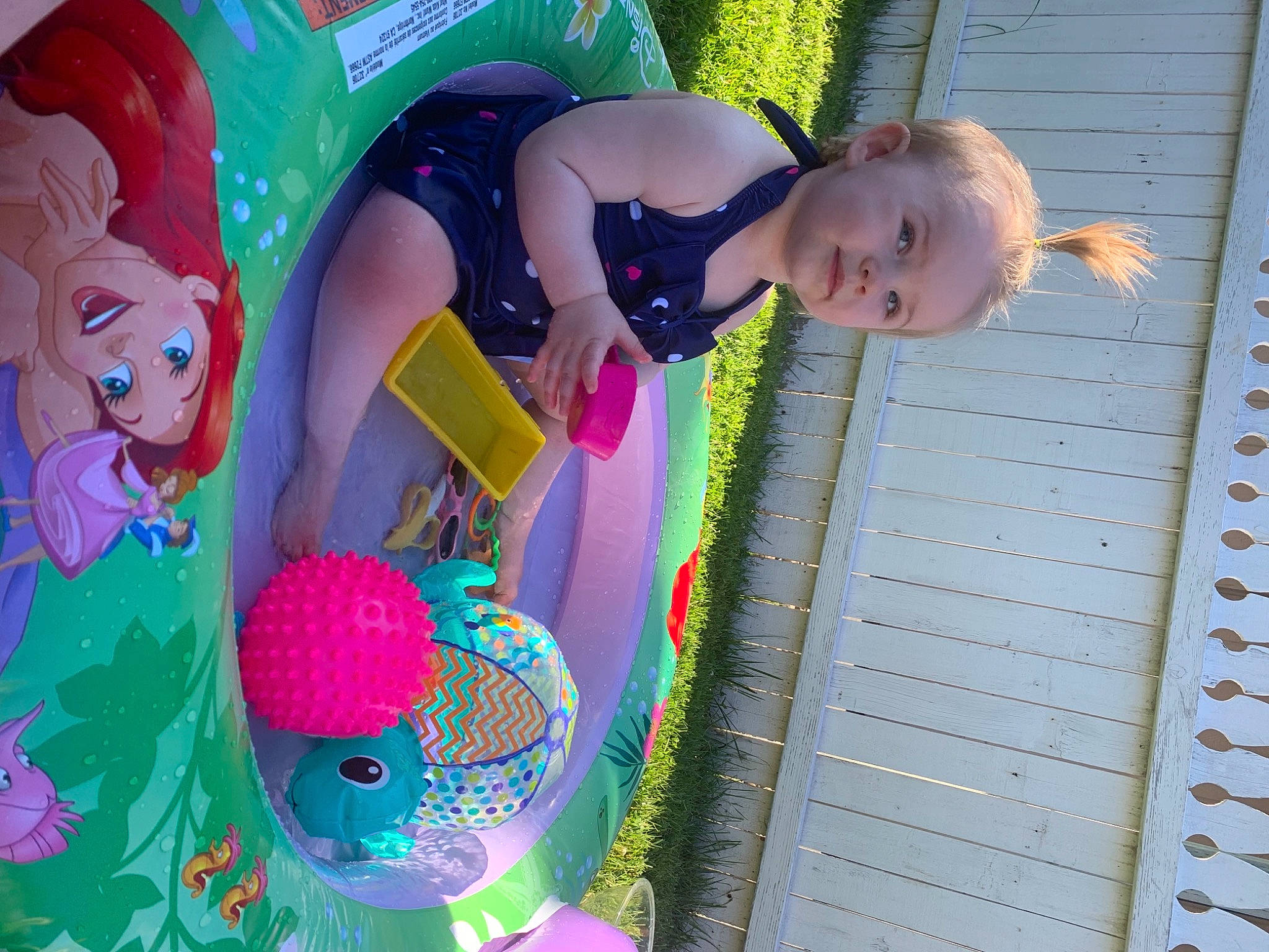 Lexie joined the competition — help win amazing prizes! art, baby_toys, balloon, child, event, fun, grass, green, happy, leisure, magenta, party_supply, person, pink, play, purple, recreation, room, toddler, toy