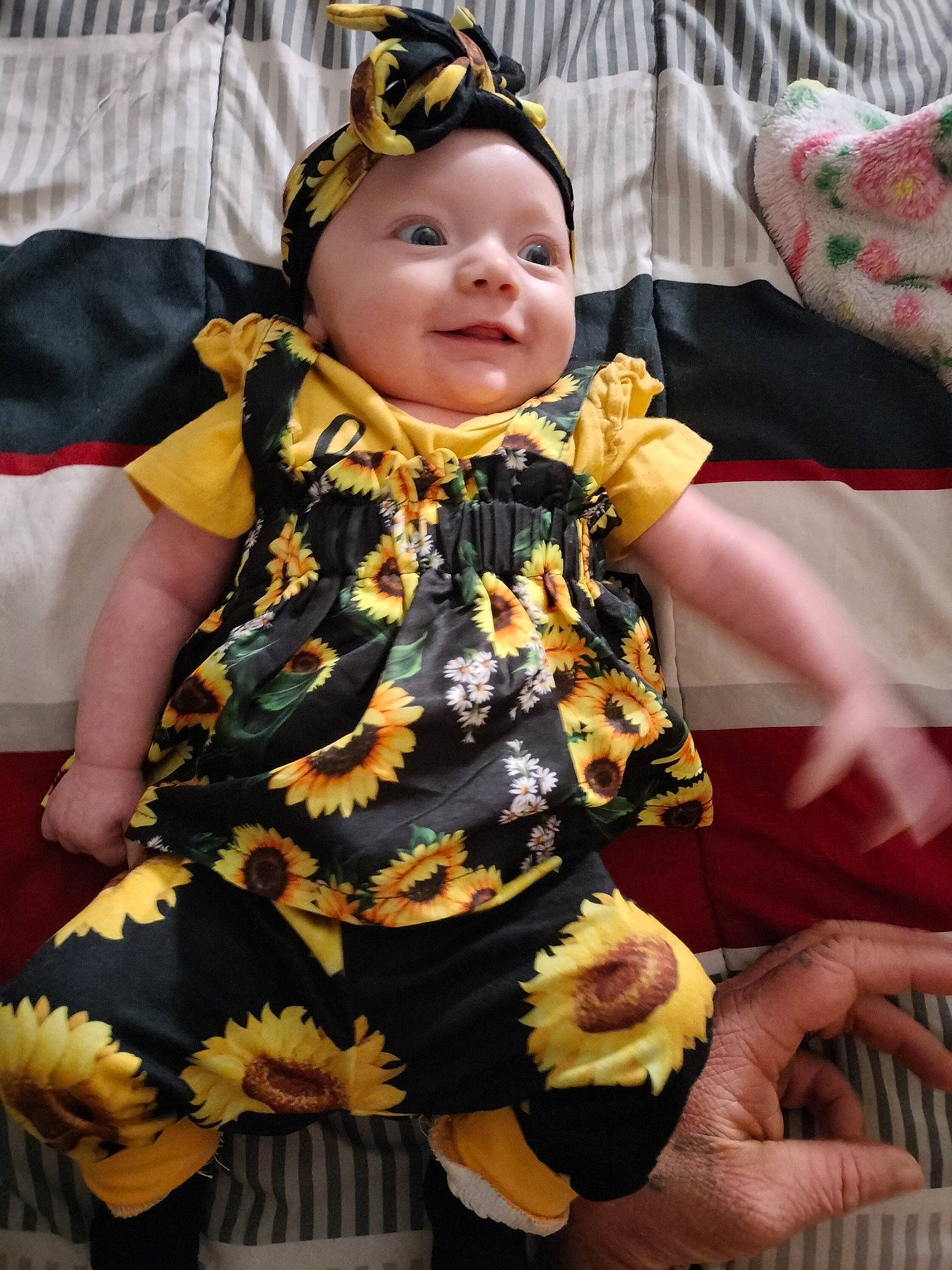 Kailani joined the competition — help win amazing prizes! baby, baby_products, baby_toddler_clothing, child, costume, event, face, fruit, fun, happy, head, headpiece, headwear, linens, party, person, room, sitting, toddler, tradition