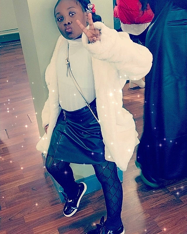 Zoey joined the competition — help win amazing prizes! blazer, cool, electric_blue, eyewear, fashion_design, footwear, formal_wear, gesture, happy, knee, leg, outerwear, person, shoe, shoulder, sleeve, sportswear, standing, thigh, tie