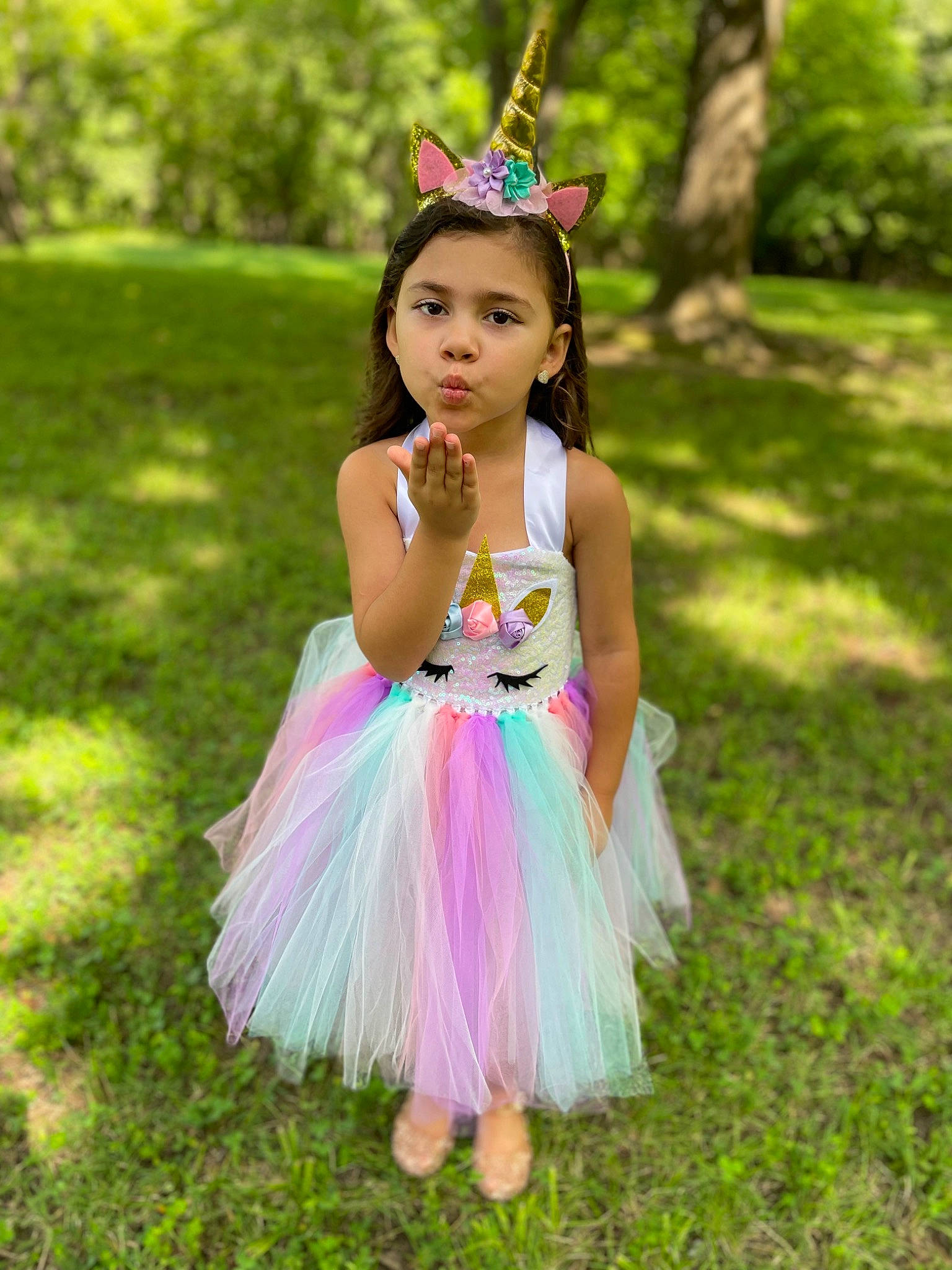 Laylah joined the competition — help win amazing prizes! botany, dress, eye, face, grass, grassland, green, hair, happy, head, headpiece, leaf, people_in_nature, person, photograph, pink, plant, summer, sunlight, toddler