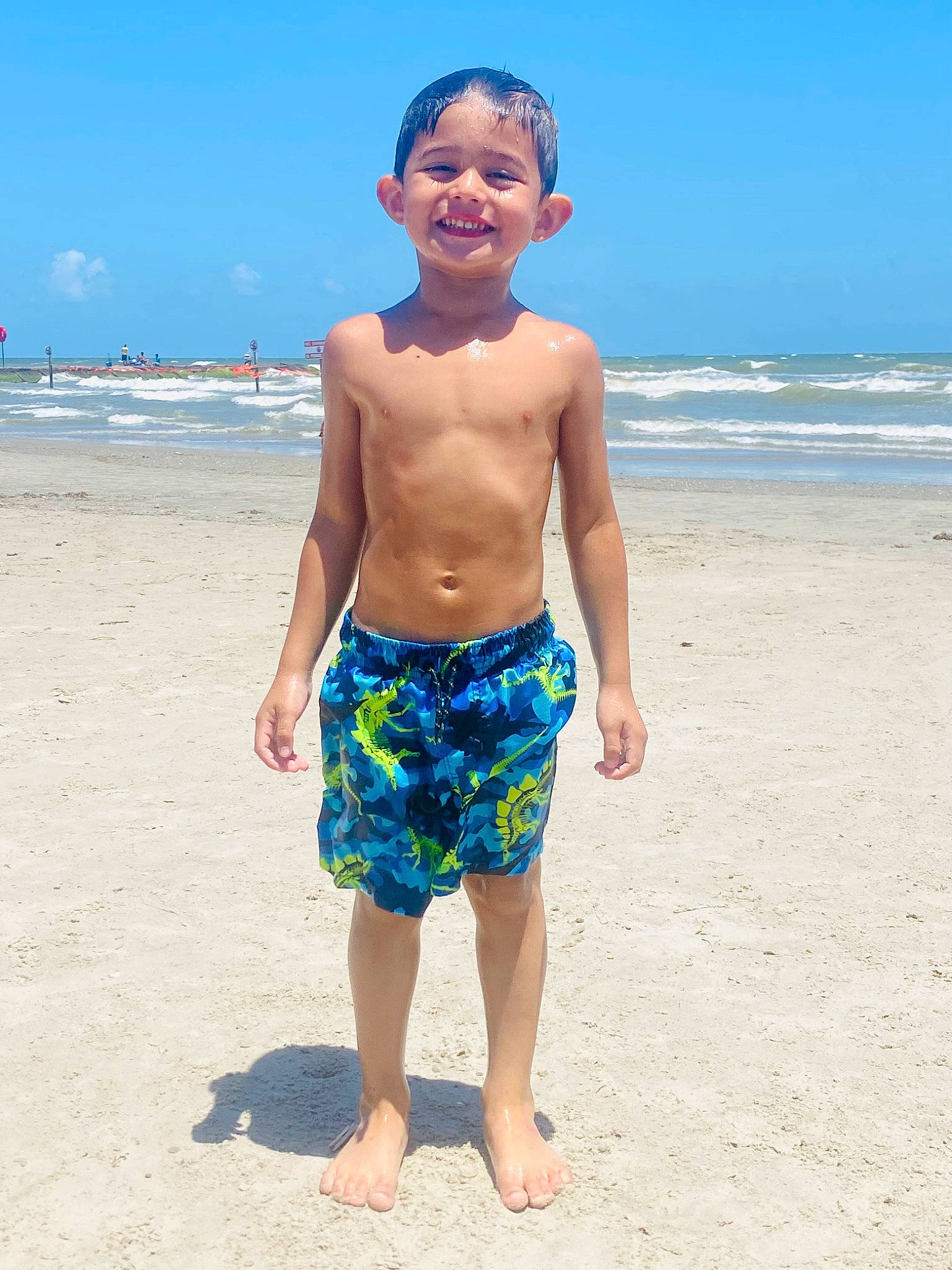 Dariel is registered to the contest to win money with this photo: azure, barefoot, beach, bermuda_shorts, board_short, chest, fun, happy, head, joy, leg, natural_environment, people_on_beach, person, shorts, sky, sleeve, smile, summer, trunk