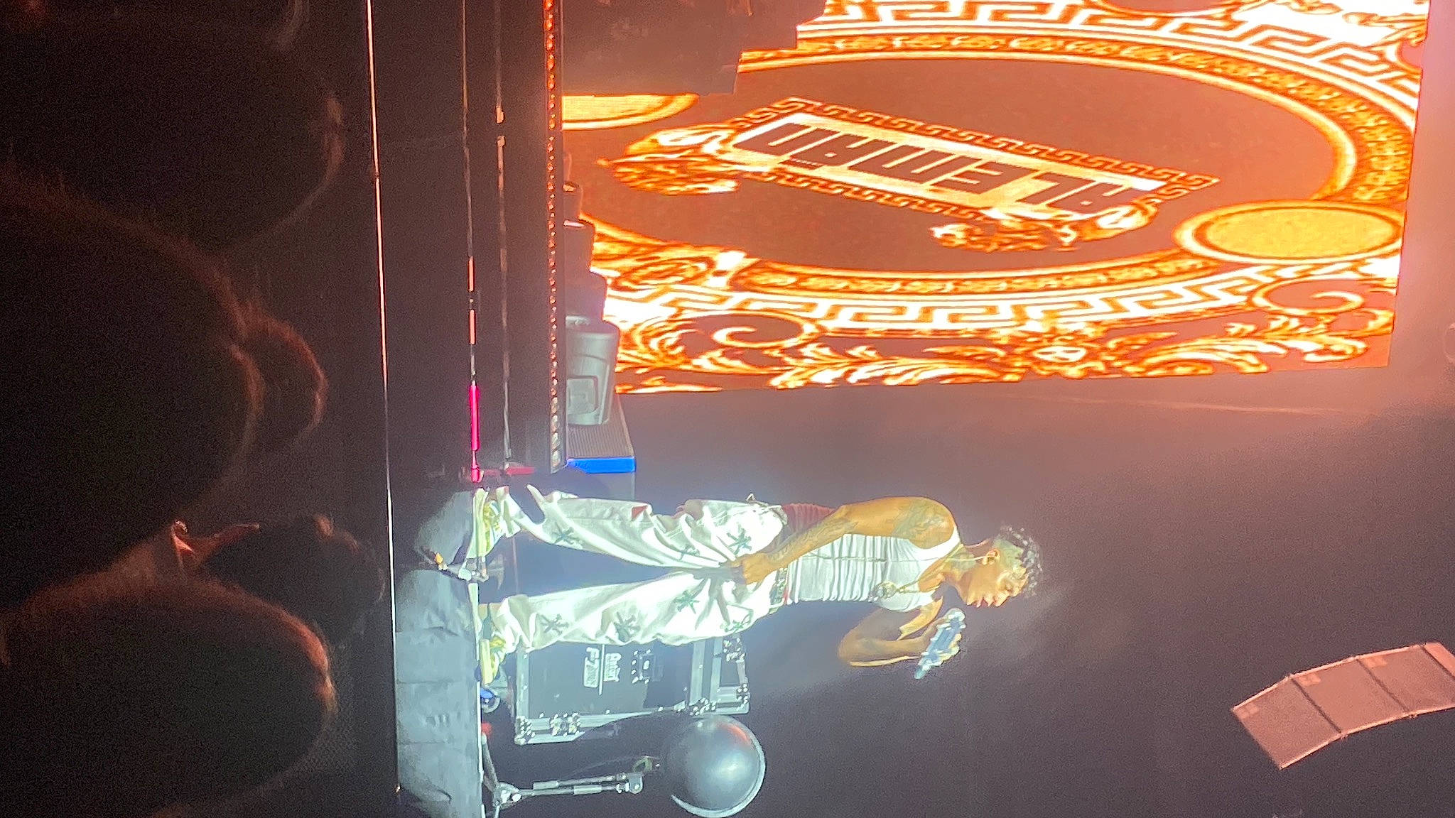 Alyssia joined the competition — help win amazing prizes! concert, darkness, display_device, electricity, electronic_signage, entertainment, event, font, fun, graphics, light, magenta, music, neon, night, performing_arts, person, signage, space, stage