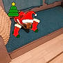 blanket, christmas, christmas_tree, couch, cozy, cute, decor, digital_stickers, dog, festive, floor, holiday, indoor, pet, red_clothing, santa_hat, small_dog, stockings, teal_couch, wood_floor
