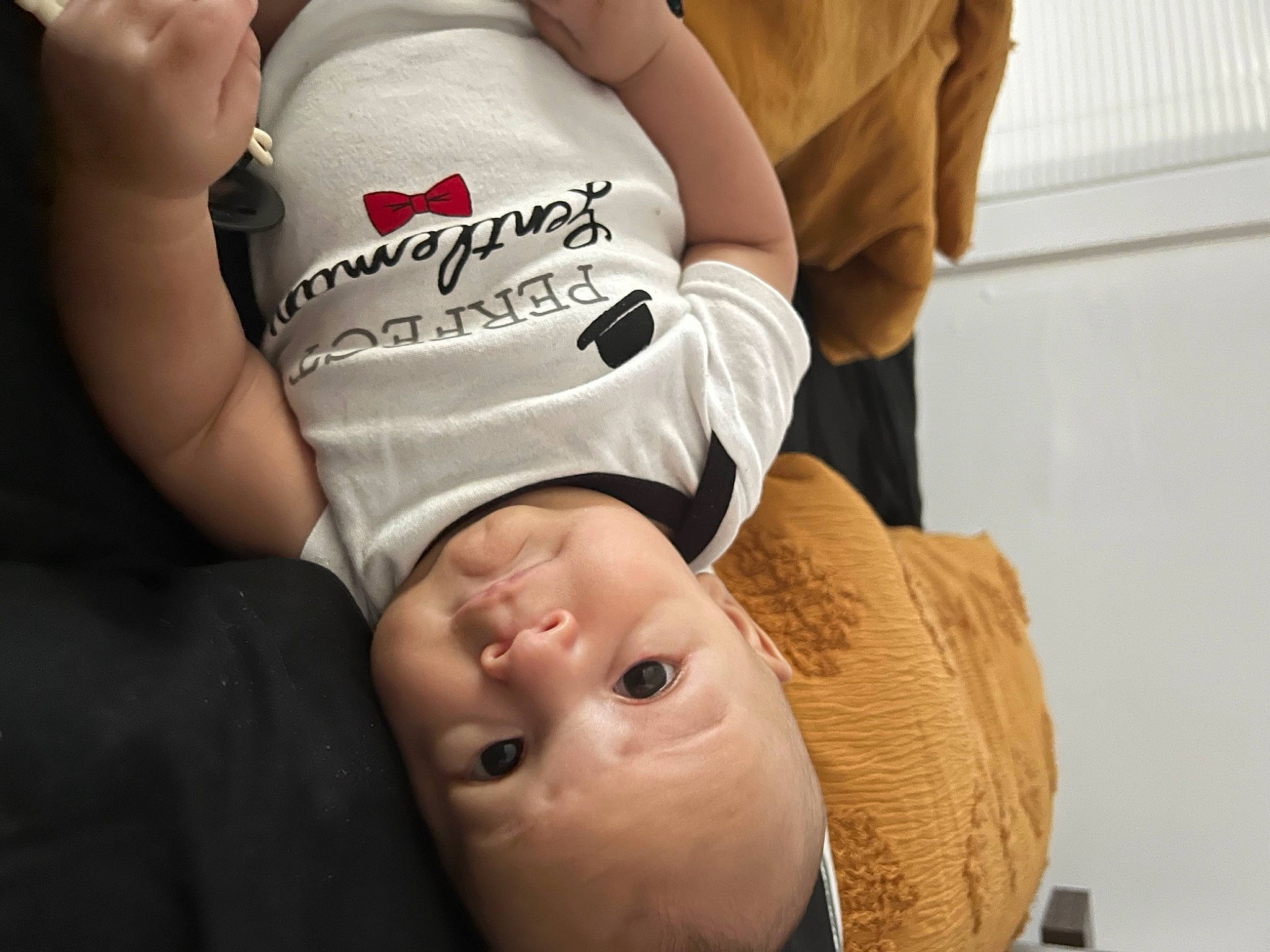 Kameron joined the competition — help win amazing prizes! abdomen, baby, baby_products, baby_toddler_clothing, cheek, chest, child, comfort, elbow, fun, gesture, happy, knee, person, room, sitting, t_shirt, thigh, toddler