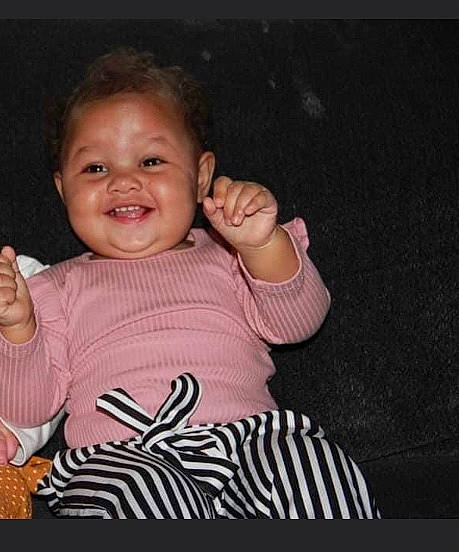 Malaya is registered to the contest to win money with this photo: arm, baby, baby_toddler_clothing, cheek, eye, finger, flash_photography, gesture, hand, happy, human_body, iris, joy, lip, mouth, neck, nose, person, skin, sleeve