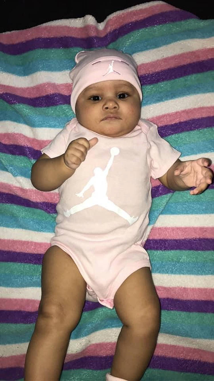 Malaya joined the competition — help win amazing prizes! baby, baby_products, baby_toddler_clothing, cap, cheek, child, chin, eye, face, head, headgear, headwear, linens, lip, pattern, person, pink, skin, sleeve, textile