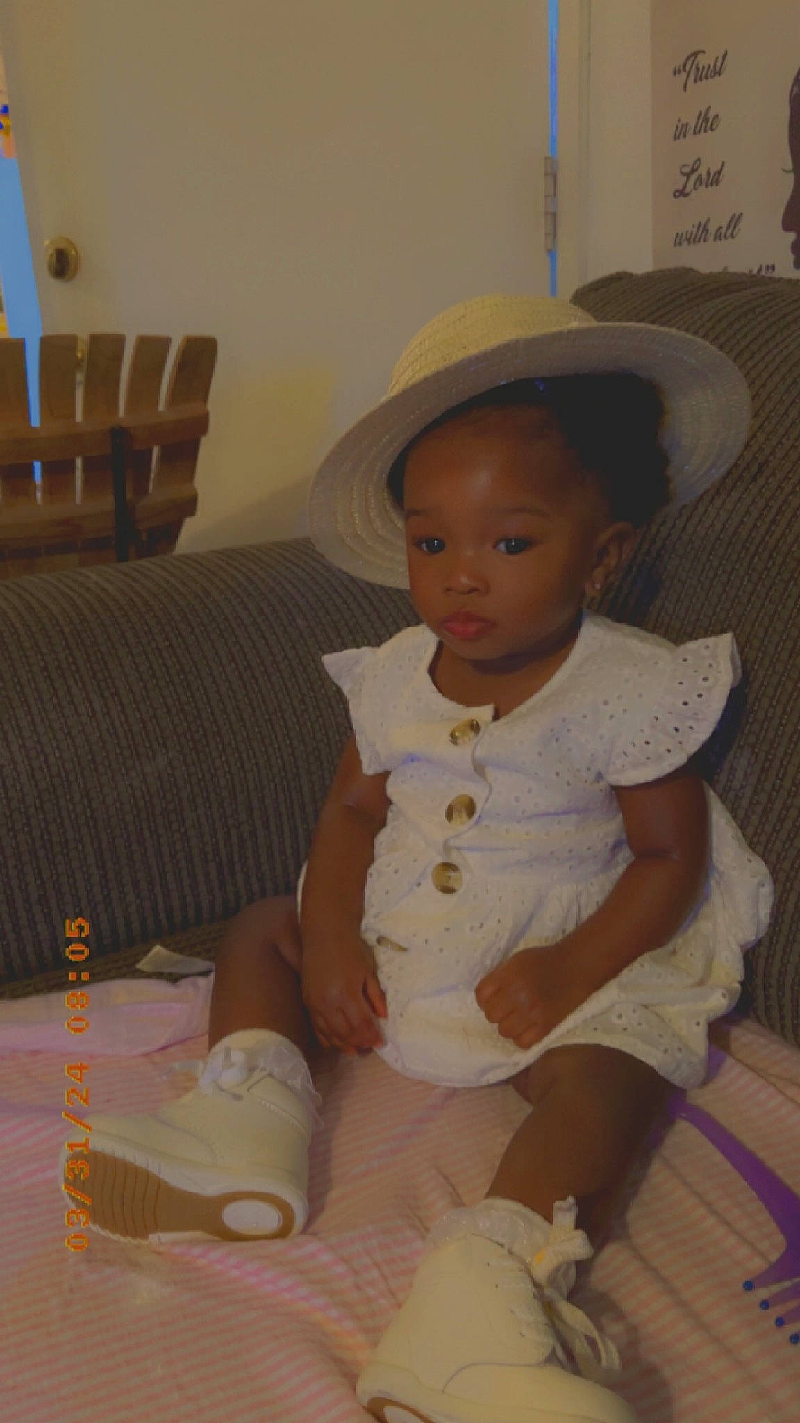 Journei is registered to the contest to win money with this photo: baby, baby_toddler_clothing, cap, chair, cheek, child, fashion_accessory, flooring, fun, hat, human_leg, knee, lap, person, room, sitting, sock, sun_hat, thigh, toddler