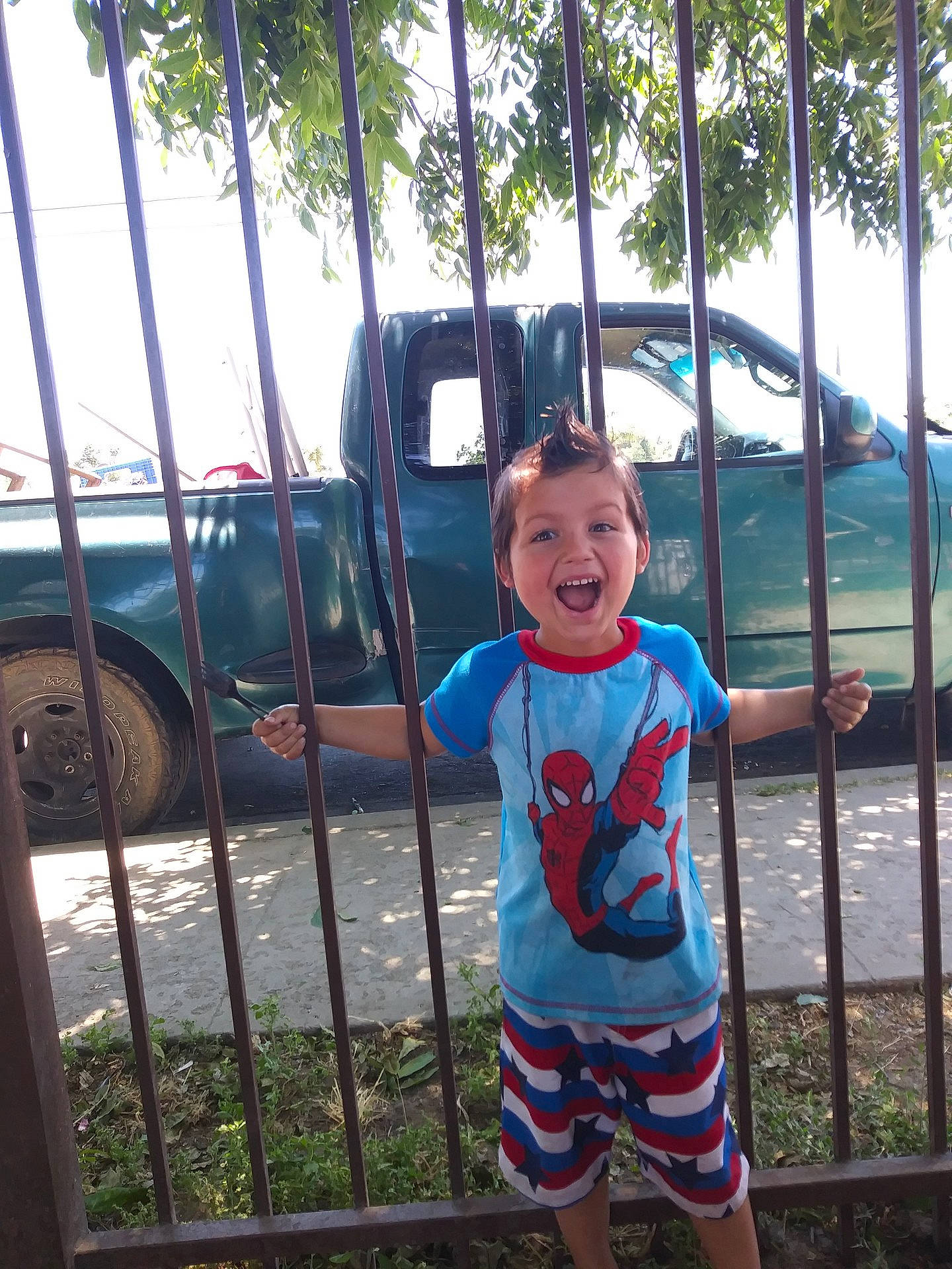 Anthony is registered to the contest to win money with this photo: blue, child, day, fun, girl, house, joy, leisure, outdoor_play_equipment, outdoor_structure, person, plant, play, playground, public_space, recreation, smile, toddler, travel, tree