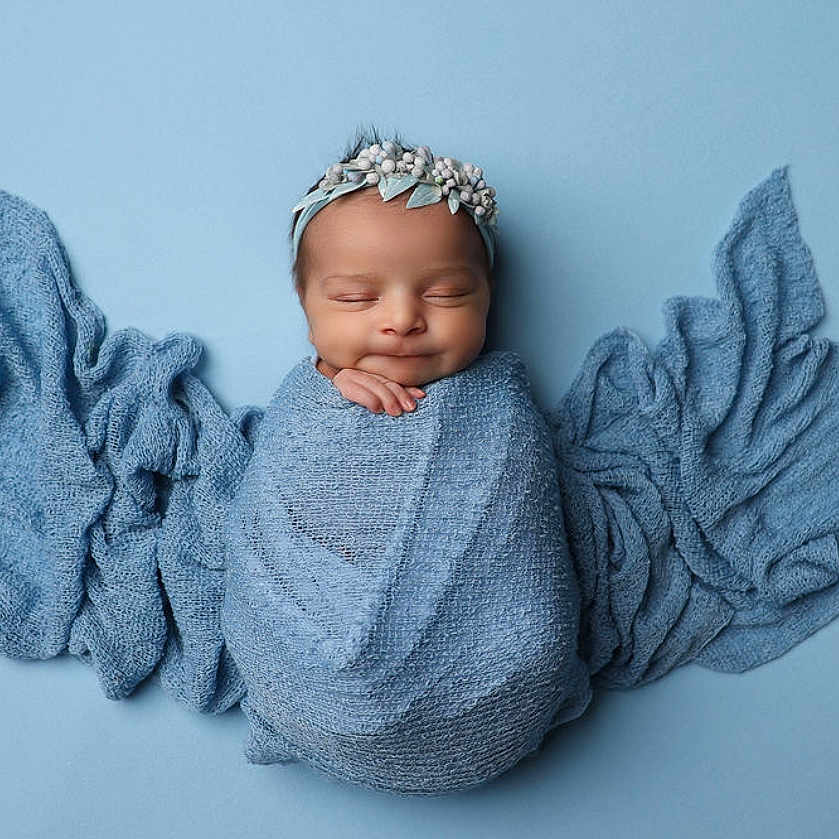 Maribelle is registered to the contest to win money with this photo: angelic, baby, background, blue_blanket, child, closeup, cute, fabric, headband, infant, newborn, peaceful, portrait, resting, sleeping, smile, soft_texture, studio, sweet, wrapped