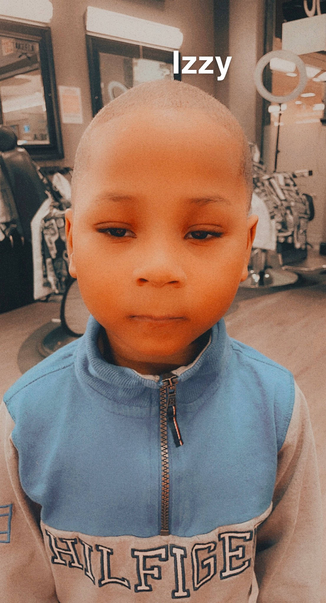 Israel is registered to the contest to win money with this photo: baby, baby_toddler_clothing, beauty_salon, buzz_cut, cheek, ear, eye, eyelash, flooring, forehead, happy, jaw, lip, mouth, neck, nose, person, skin, sleeve, t_shirt