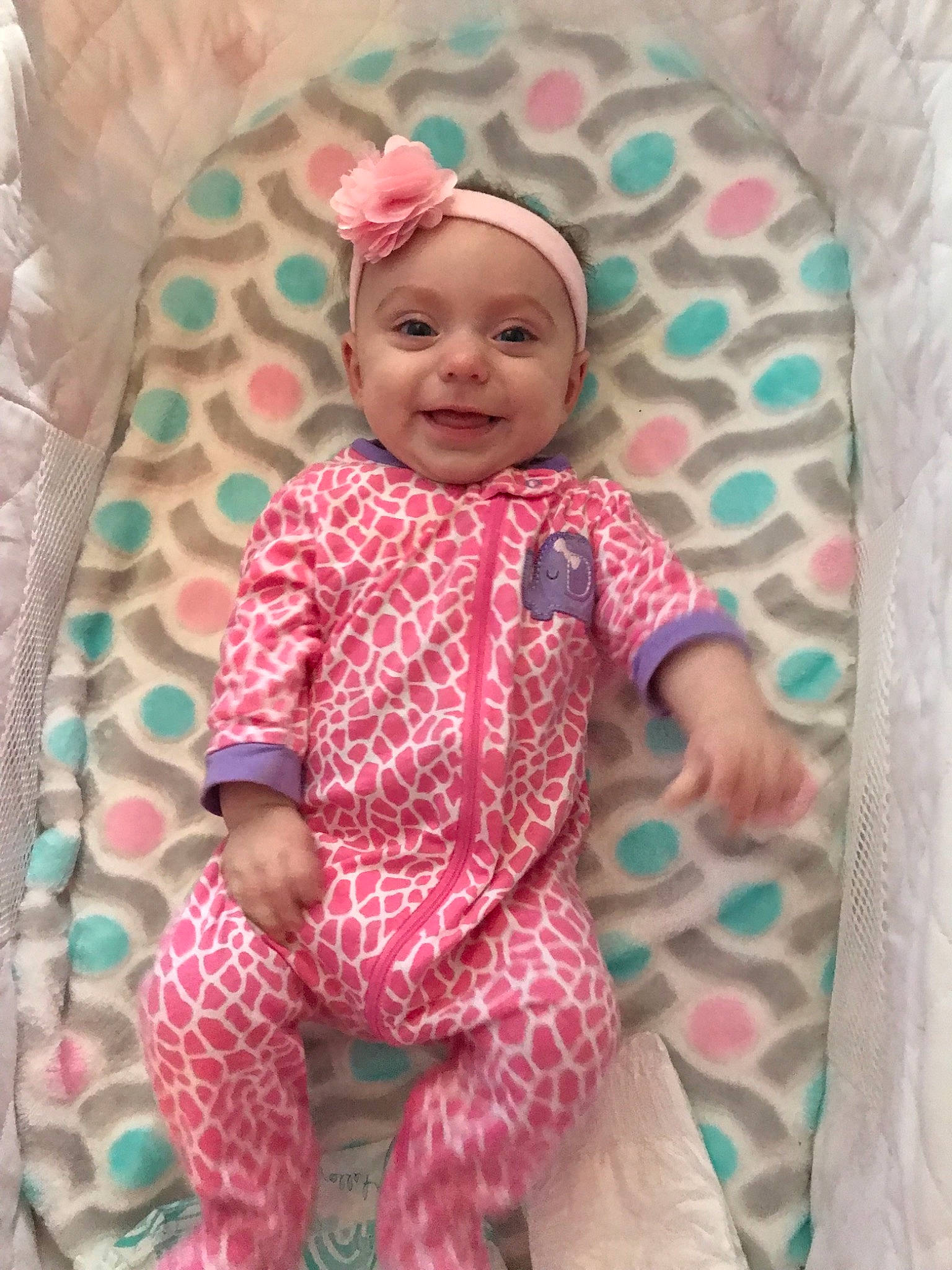 Isabella is registered to the contest to win money with this photo: baby, baby_products, baby_toddler_clothing, child, design, joy, pattern, person, pink, product, smile, textile, toddler