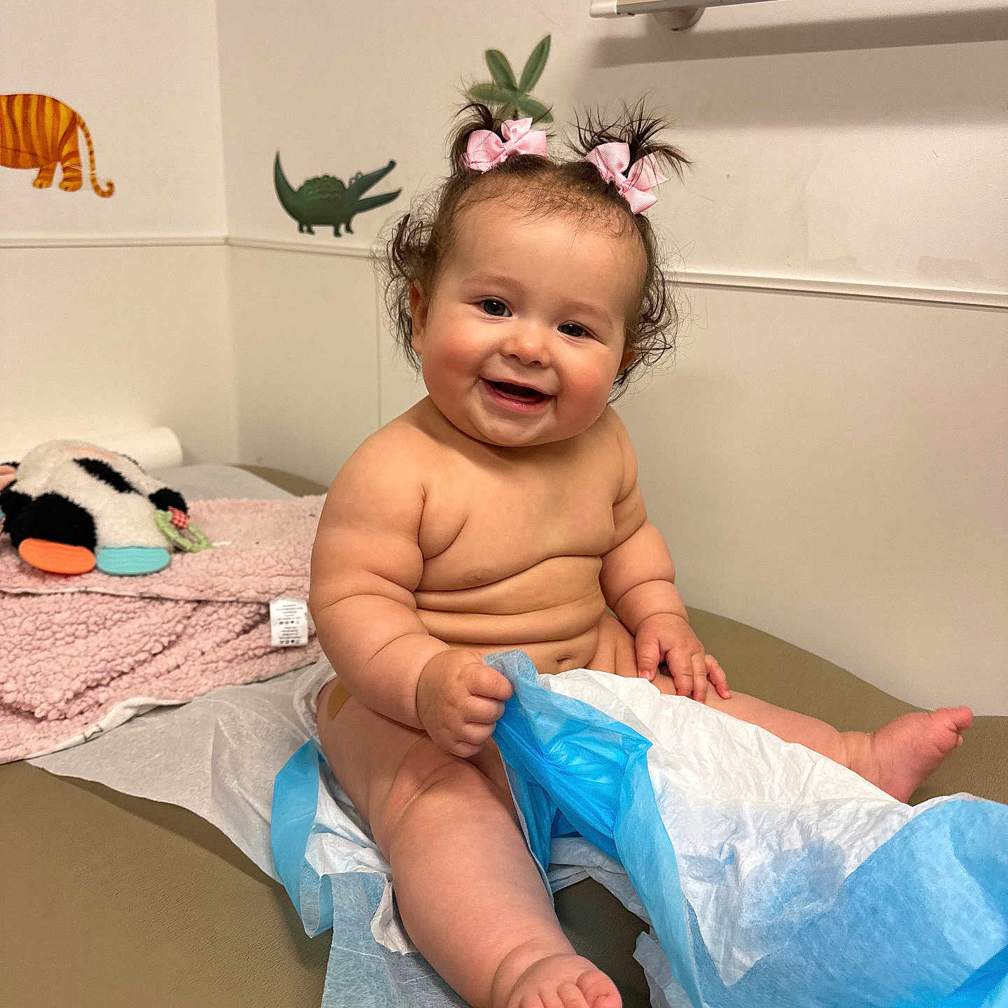 Aaliyah Leilani is registered to the contest to win money with this photo: baby, babylaughing, bodypart, clothing, diaper, dress, face, finger, flower, flowerarrangement, hand, happy, head, indoors, person, photography, portrait, sitting, smile, towel