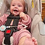 Patsy joined the competition — help win amazing prizes! baby, cabinets, car_seat, child, closeup, cute, face, foot, happy, indoor, infancy, infant, kitchen, person, pink_clothing, safety, seatbelt, smiling, toy, wood