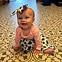 Patsy joined the competition — help win amazing prizes! baby, infant, child, smiling, sitting, headband, bow, clothing, floor, patterned_floor, tile, indoors, cute, happy, person, portrait, hand, foot, pink_shirt, cow_print