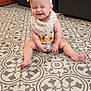 Patsy is registered to the contest to win money with this photo: baby, child, floor, tile, pattern, headband, bow, smile, happy, indoors, sitting, clothing, cute, infant, person, face, legs, barefoot, expression, playful