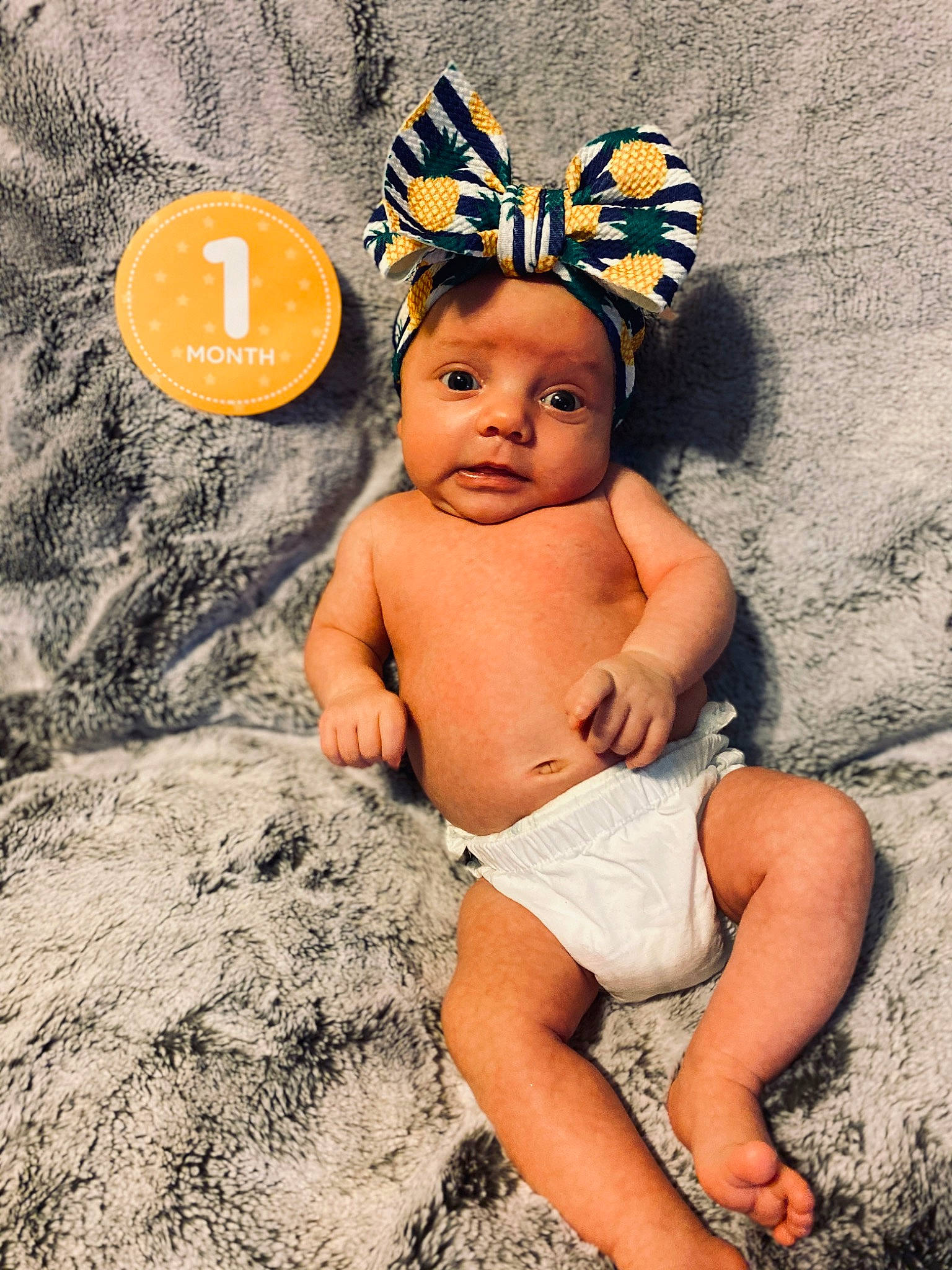 Scottlynn is registered to the contest to win money with this photo: baby, baby_bloomers, baby_toddler_clothing, child, child_model, costume_accessory, design, ear, hair_accessory, happy, headgear, headpiece, pattern, person, photography, product, smile, toddler, yellow