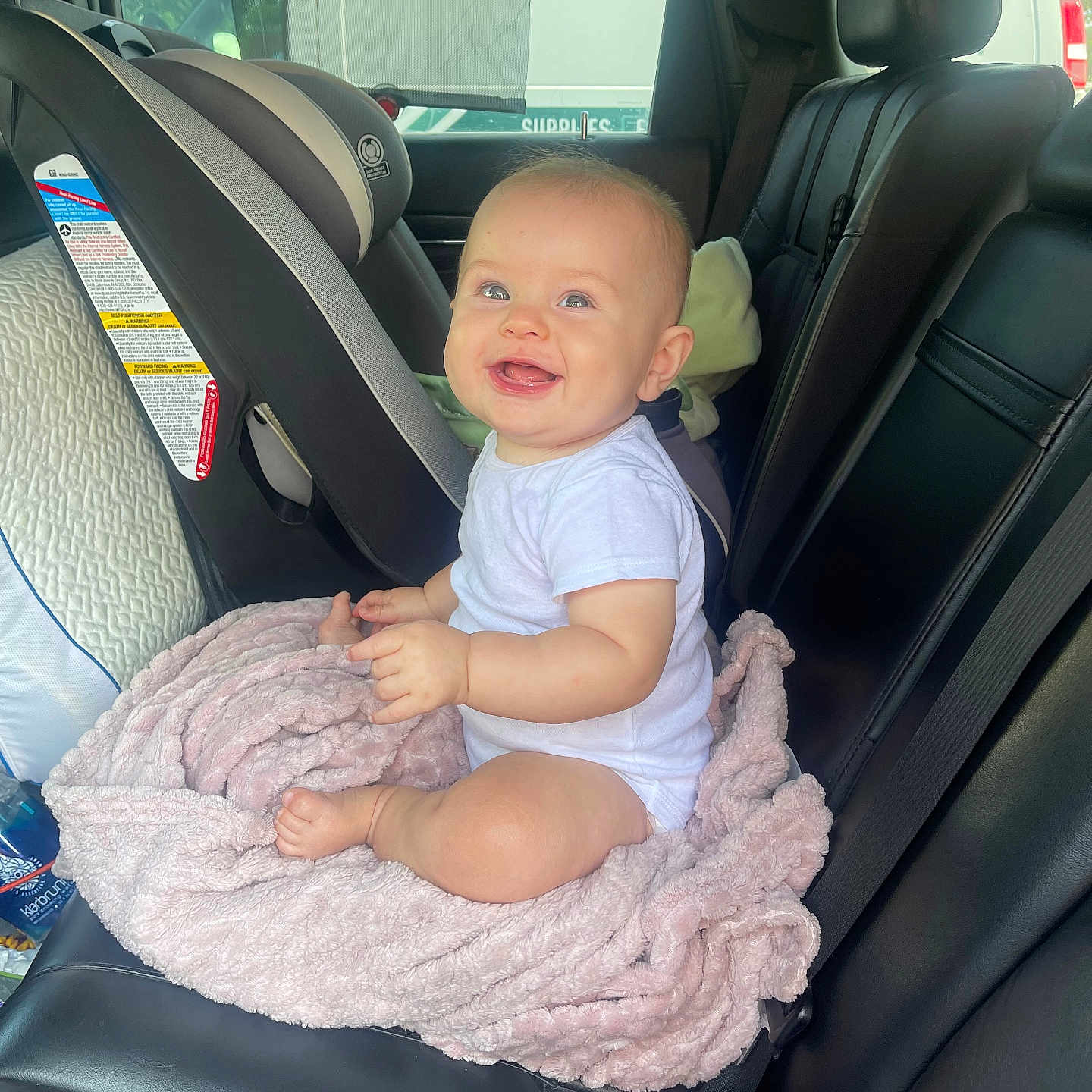 Kailoni joined the competition — help win amazing prizes! baby, blanket, bodypart, car, car_interior, carseat, clothing, cushion, dress, face, head, headrest, homedecor, person, photography, portrait, sitting, t_shirt, transportation, vehicle