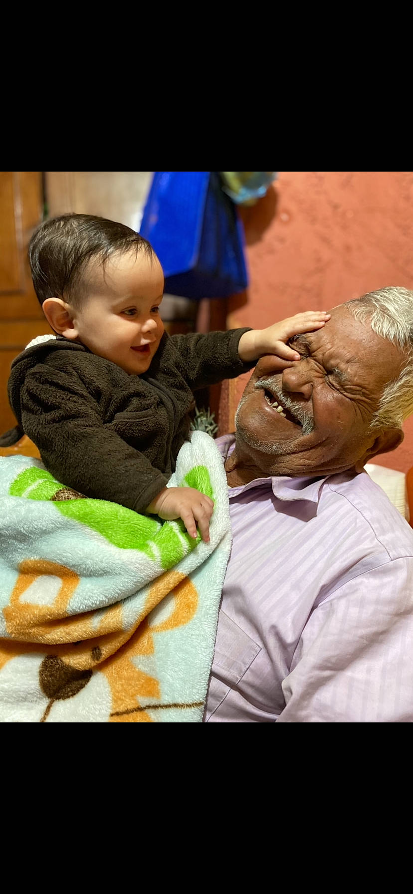 Marcus is registered to the contest to win money with this photo: adaptation, baby, child, event, finger, fun, gesture, hand, happy, interaction, joy, leisure, mammal, nose, person, product, skin, smile, t_shirt, thumb