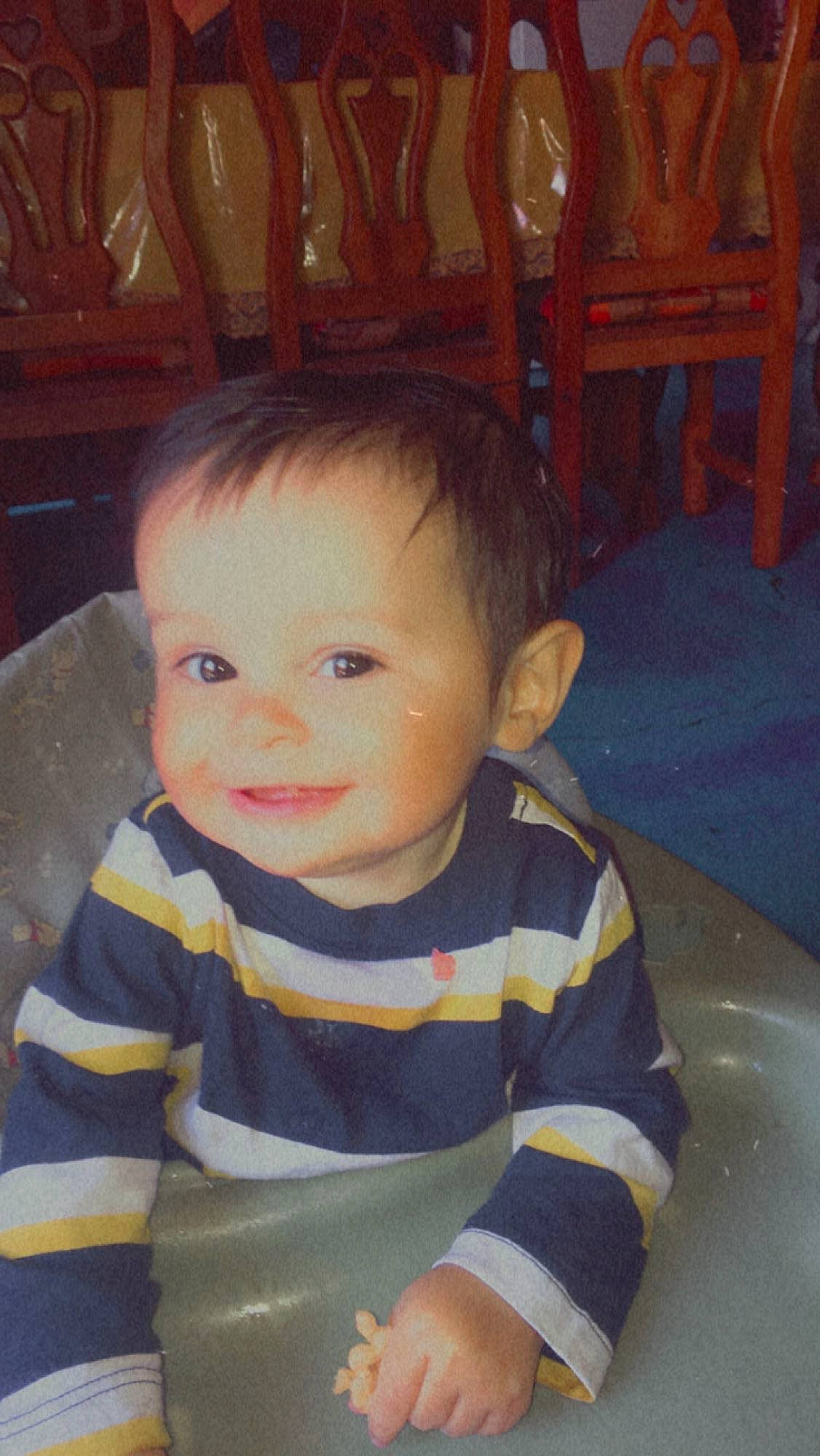 Marcus is registered to the contest to win money with this photo: baby, baby_toddler_clothing, cheek, chin, eye, face, fun, hair, hairstyle, happy, head, human_body, iris, mouth, nose, organ, person, skin, sleeve, smile