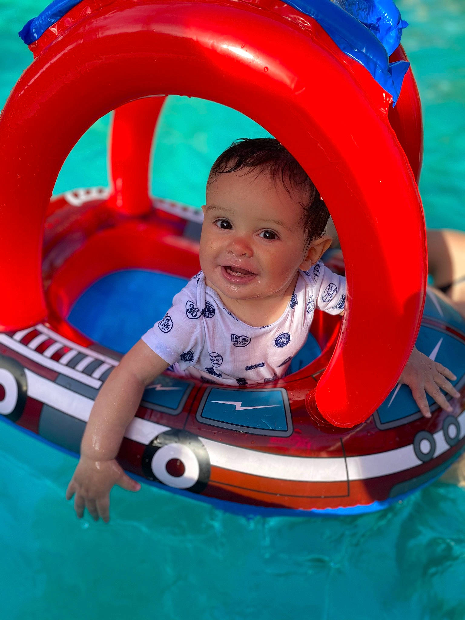Marcus joined the competition — help win amazing prizes! baby, baby_products, baby_toddler_clothing, blue, child, eye, face, fun, games, happy, inflatable, joy, leisure, outdoor_recreation, person, personal_protective_equipment, play, recreation, red, smile