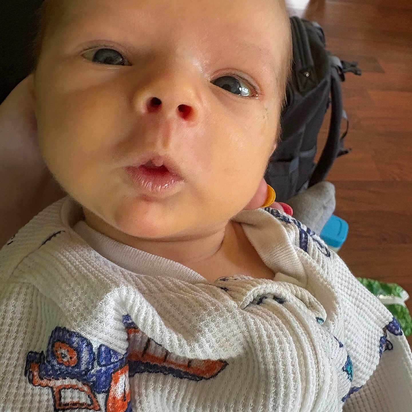 Oakley is registered to the contest to win money with this photo: baby, birthdaycake, cake, clothing, cream, cushion, dessert, face, food, frown, head, knitwear, people, person, photography, portrait, sad, selfie, spitting, sweater