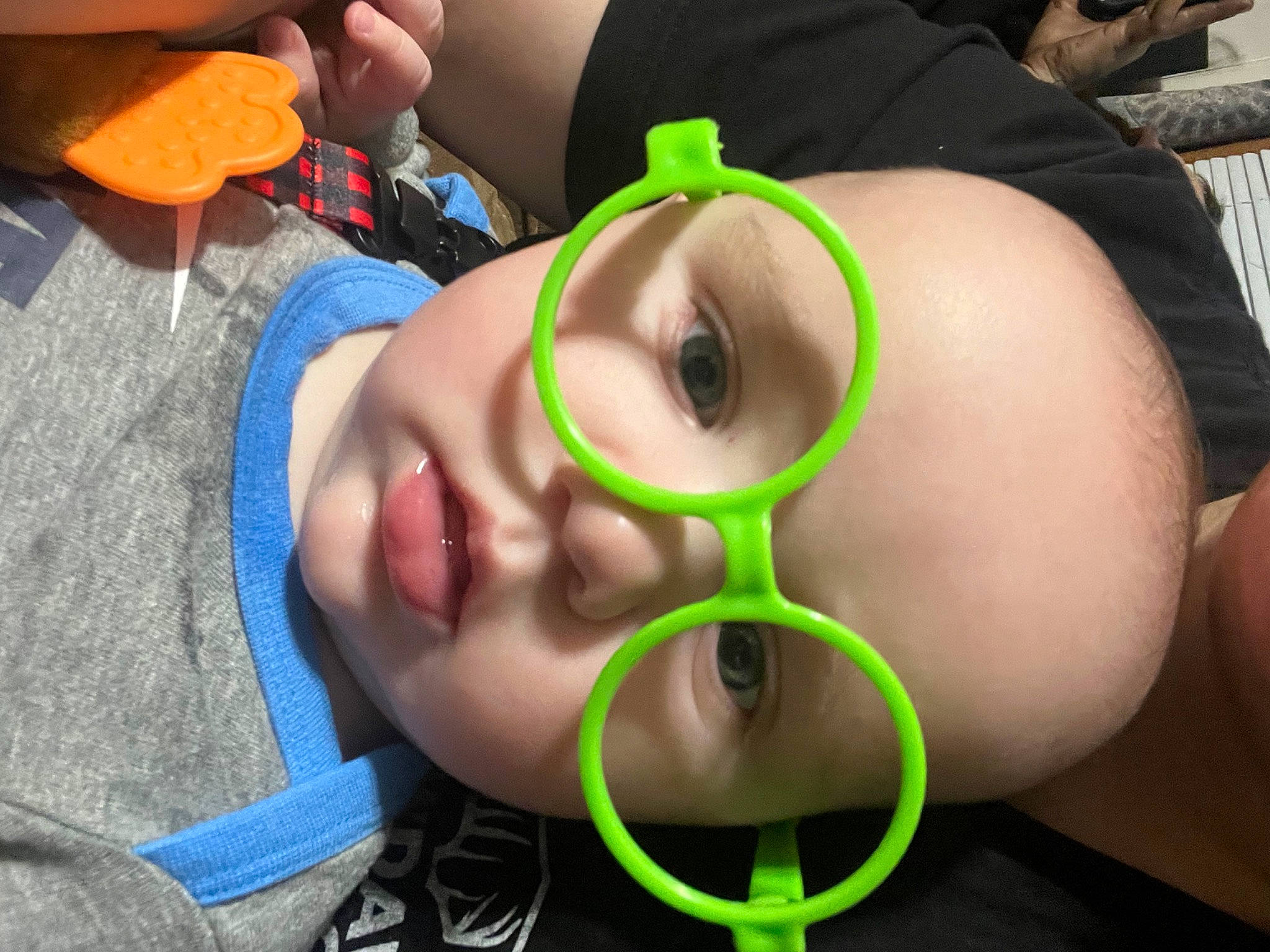 Jonah is registered to the contest to win money with this photo: audio_equipment, black_hair, close_up, cool, eyebrow, eyelash, eyewear, fashion_accessory, finger, fun, gadget, grass, hairstyle, headgear, hearing, mouth, nose, person, personal_protective_equipment, selfie