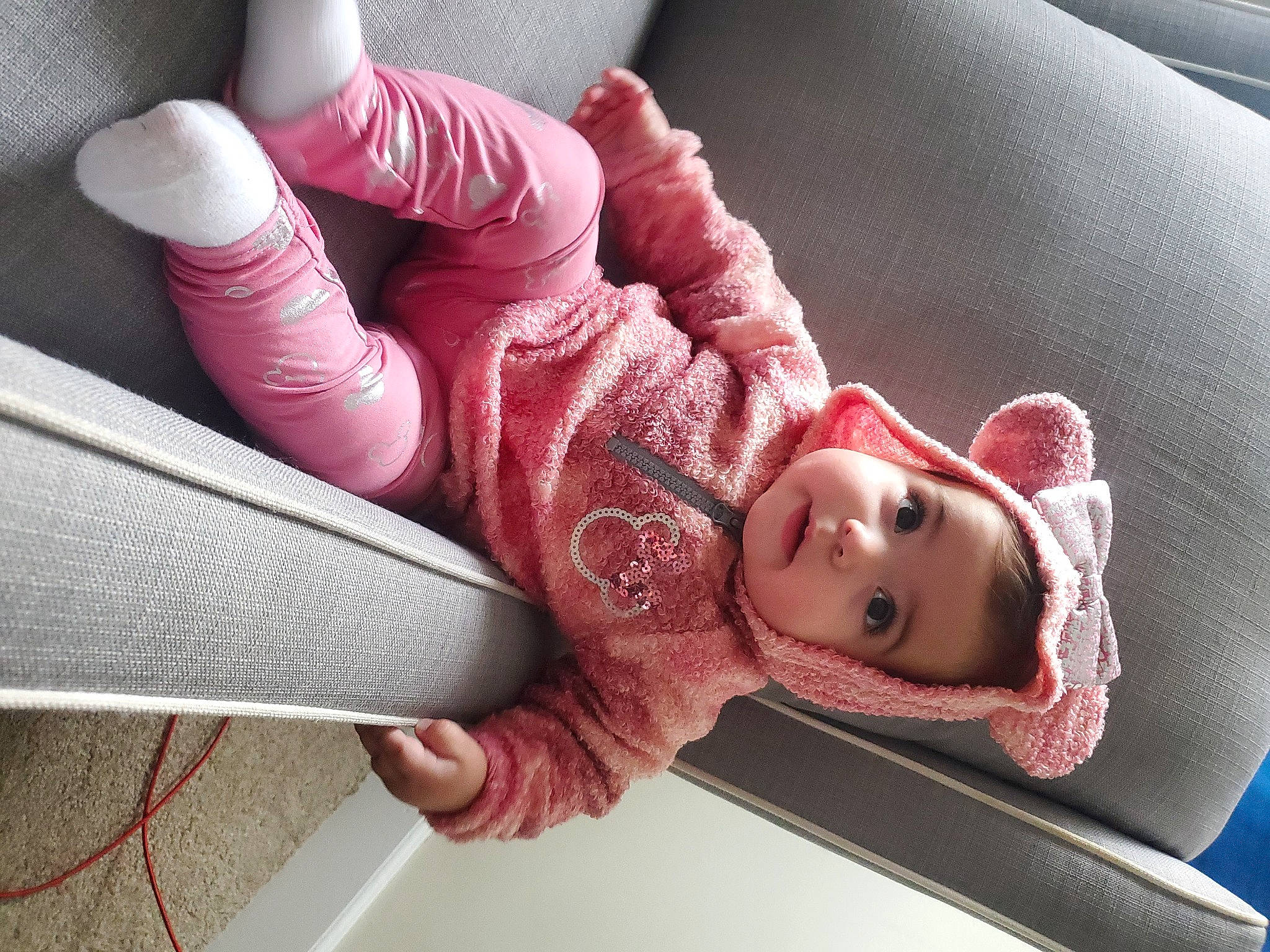 Ariana joined the competition — help win amazing prizes! arm, comfort, eyelash, finger, gesture, hand, human, human_body, joint, leg, lip, organ, outerwear, person, pink, product, shoulder, skin, sleeve, textile