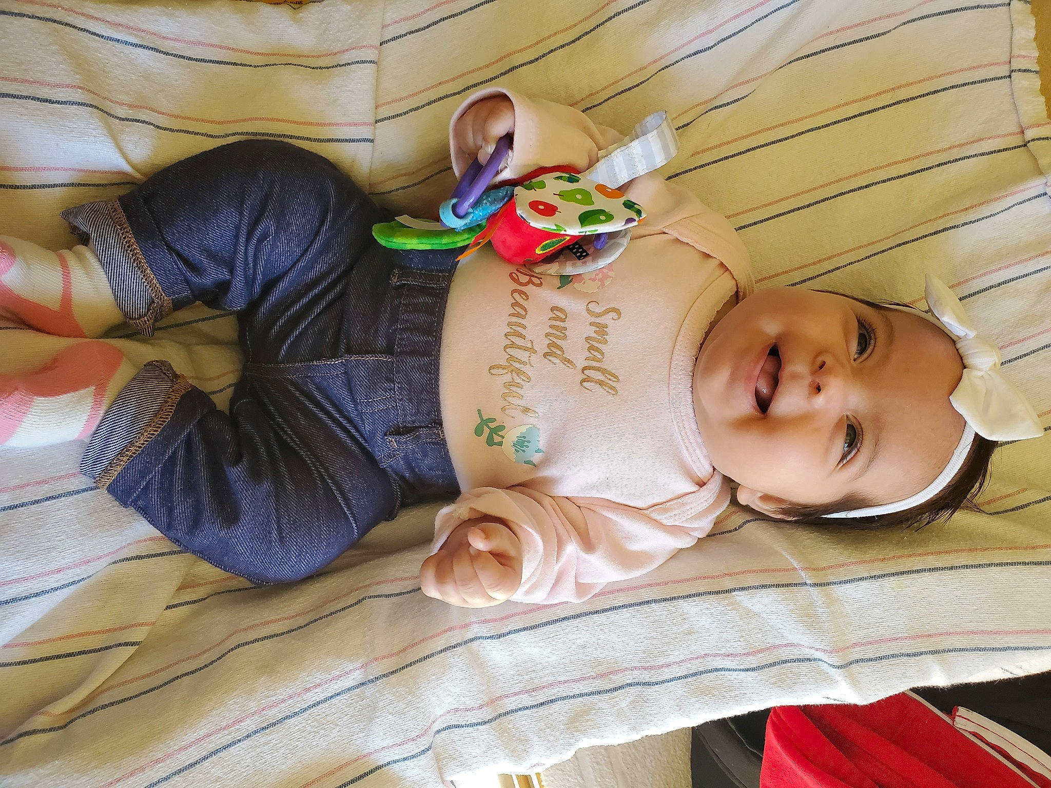 Ariana joined the competition — help win amazing prizes! abdomen, baby, baby_products, baby_toddler_clothing, child, comfort, doll, fashion_accessory, headwear, human_leg, linens, person, room, sitting, sleep, textile, toddler, toy, vertebrate, wood