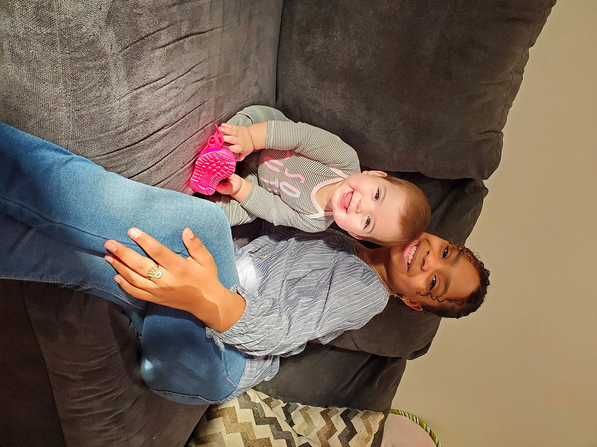 Giselle is registered to the contest to win money with this photo: baby, child, comfort, elbow, eye, finger, flash_photography, fun, gesture, hand, happy, joy, nap, person, sitting, skin, sleeve, smile, thigh, toddler