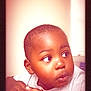 Khimerie is registered to the contest to win money with this photo: toddler, child, face, hands, curious, portrait, indoors, expression, skin, short_hair, looking_away, soft_light, warm_tone, young_child, casual_clothing, resting, human, closeup, person, cute