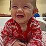 Thomas is registered to the contest to win money with this photo: baby, child, smiling, happy, crawling, sweater, red, white, striped, indoor, person, face, hands, clothing, tablecloth, joyful, cute, infant, portrait, closeup