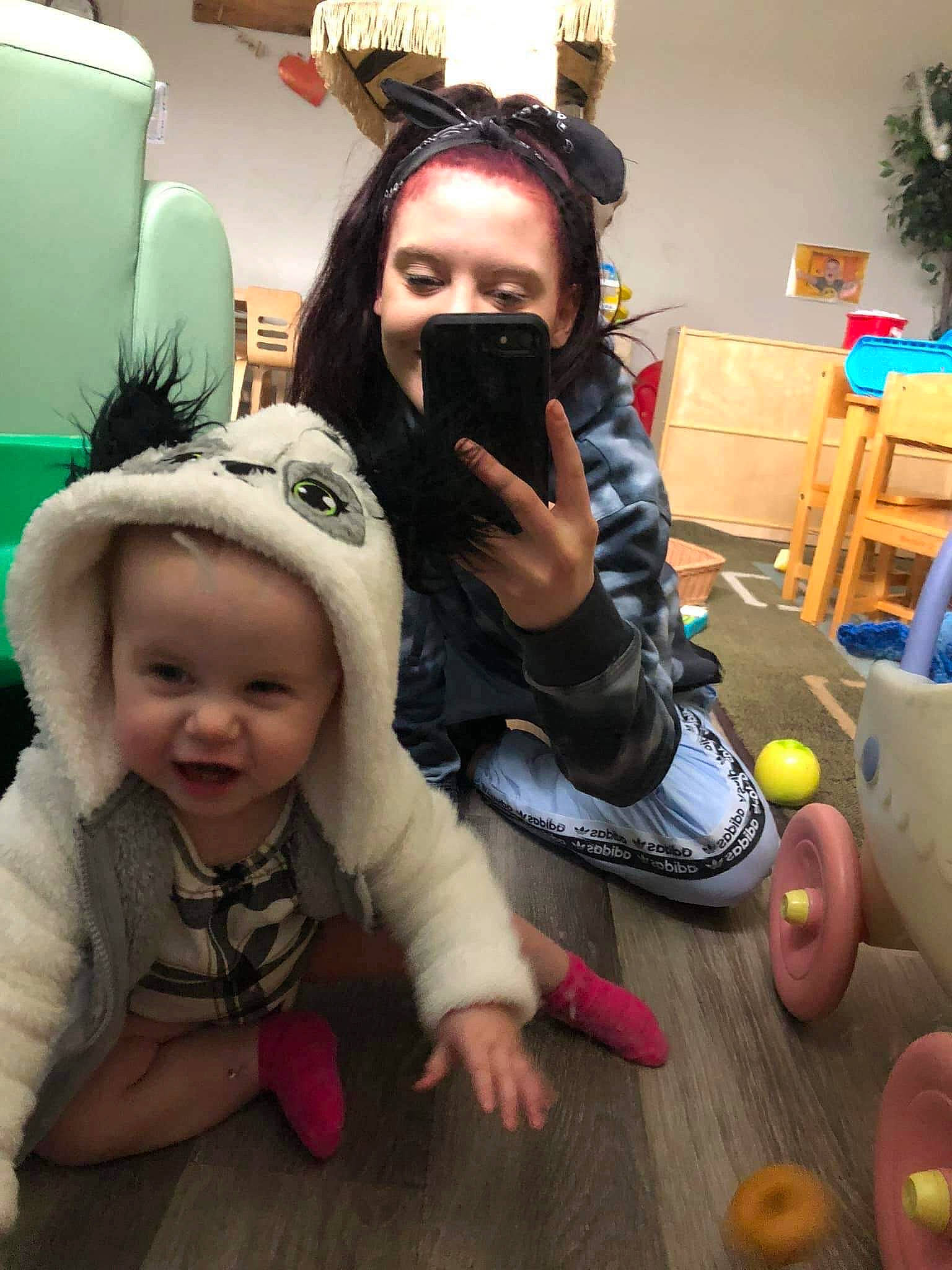 Kaeleigh May joined the competition — help win amazing prizes! baby, beard, chair, child, event, eyewear, facial_hair, flooring, fun, fur, happy, houseplant, person, personal_protective_equipment, room, sitting, sunglasses, toddler, vacation, wood