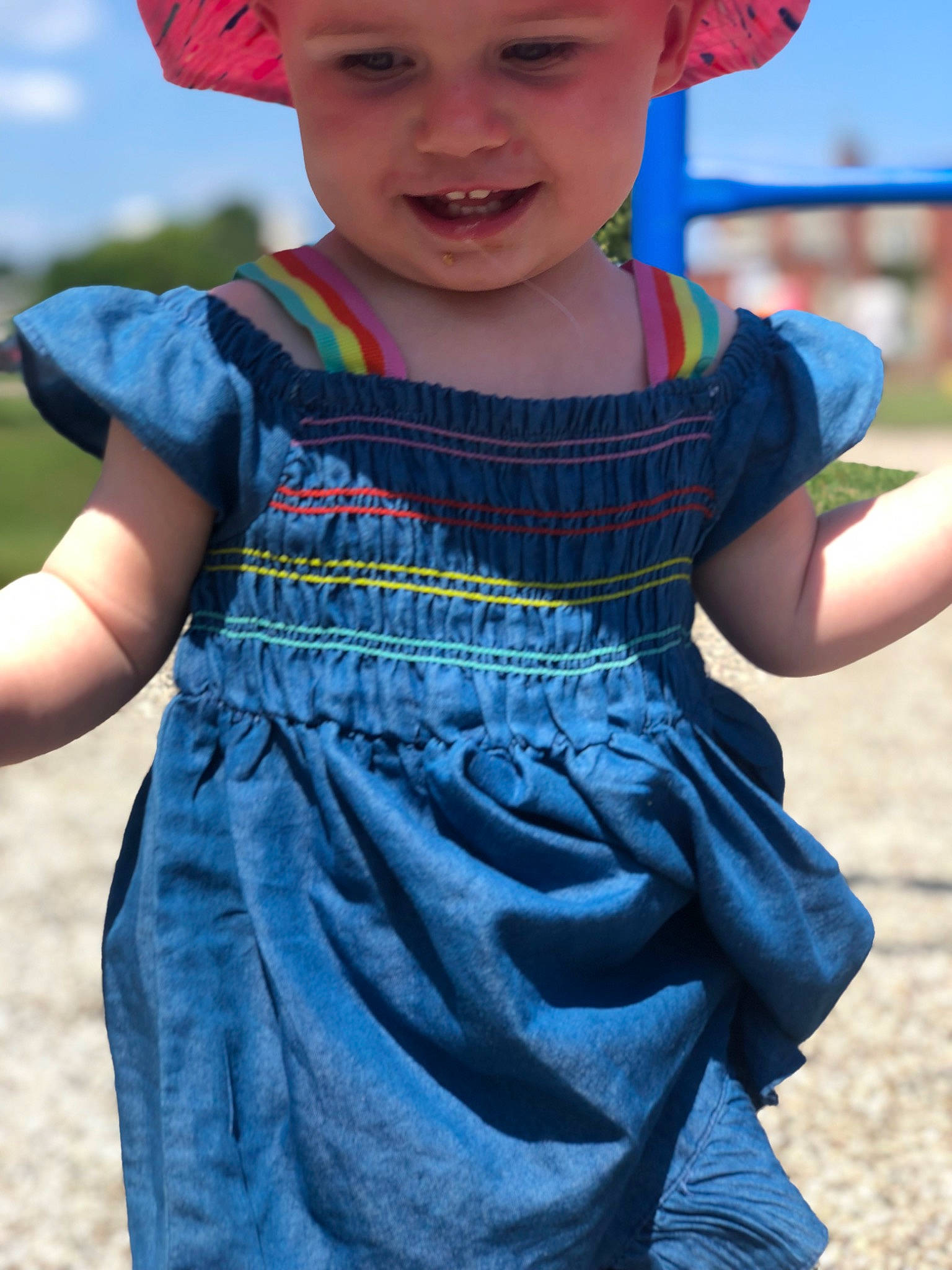 Kaeleigh May joined the competition — help win amazing prizes! azure, baby_toddler_clothing, blue, cool, dress, fashion, grass, happy, headwear, joy, one_piece_garment, person, pink, public_space, red, skin, sky, sleeve, smile, standing