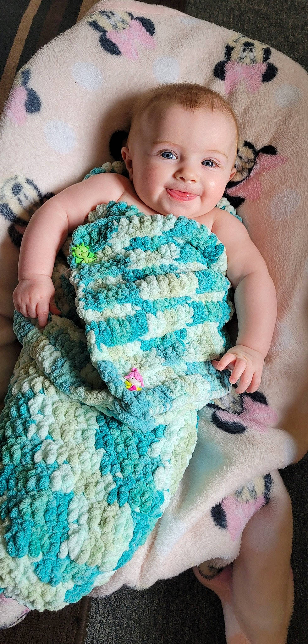 Stevie joined the competition — help win amazing prizes! aqua, azure, baby, baby_toddler_clothing, blue, cheek, eye, face, finger, flash_photography, green, happy, iris, joy, person, pink, purple, skin, sleeve, smile